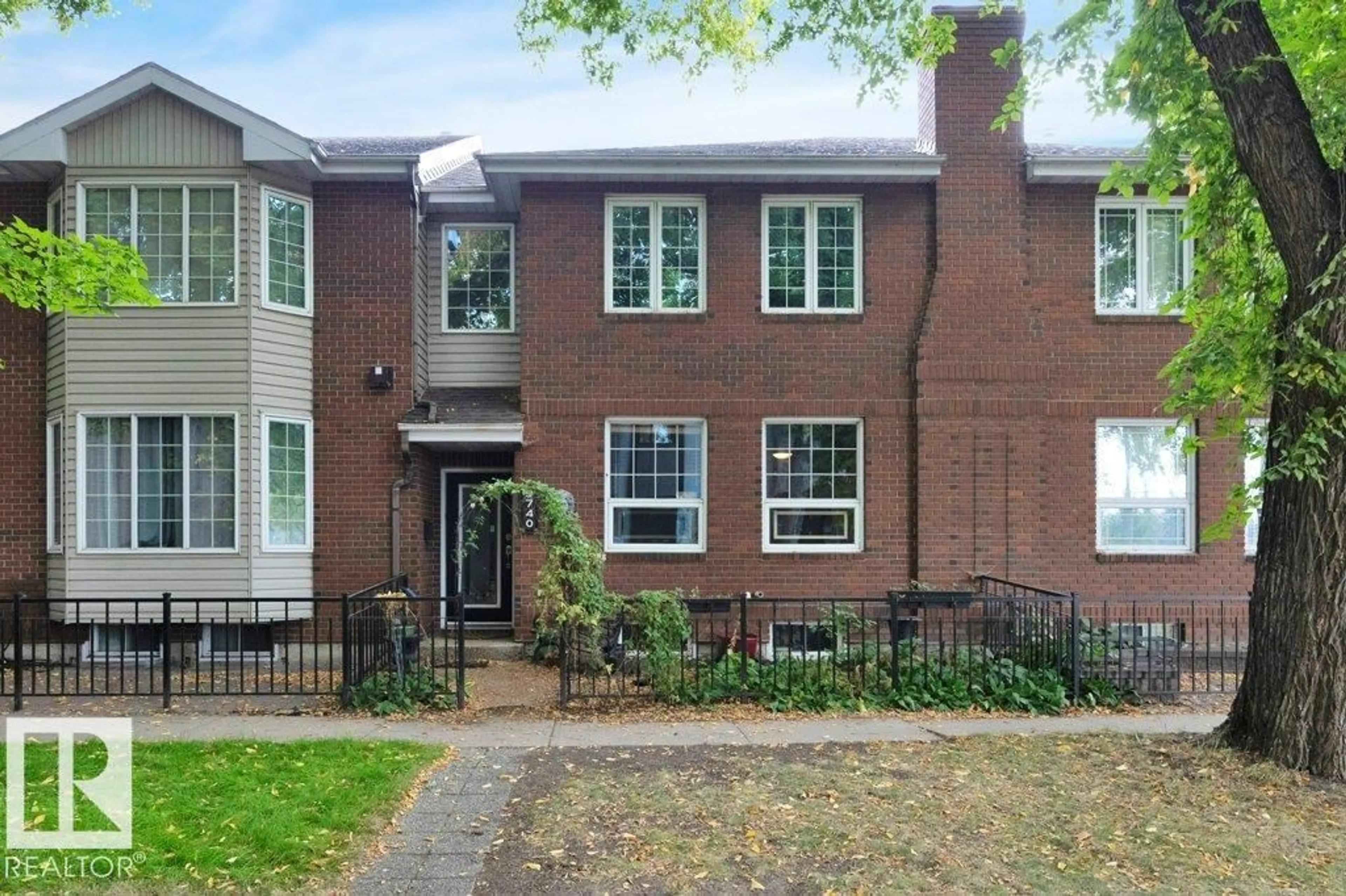 Home with brick exterior material, street for 9740 101 ST, Edmonton Alberta T5K0W8