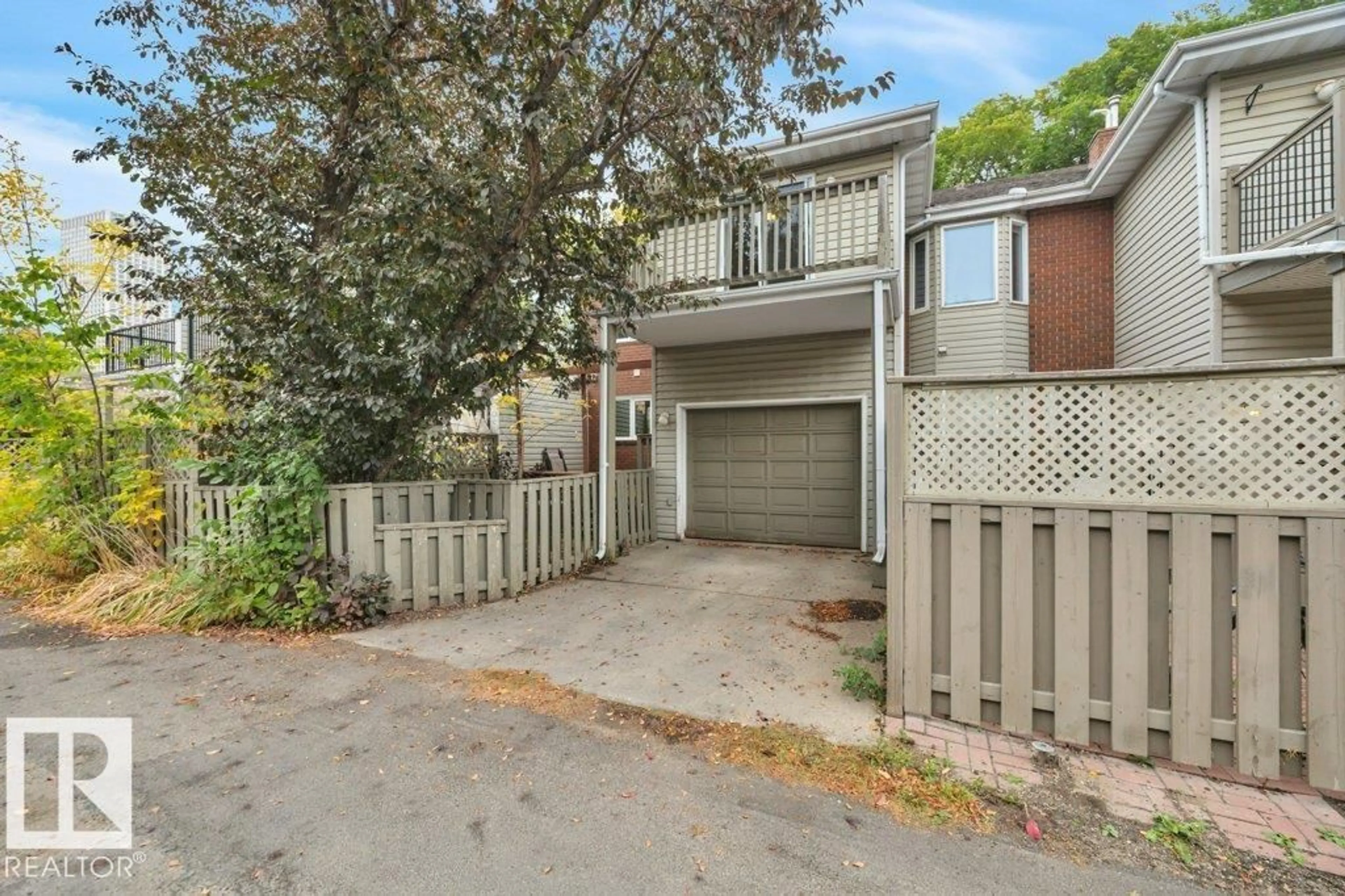 A pic from outside/outdoor area/front of a property/back of a property/a pic from drone, street for 9740 101 ST, Edmonton Alberta T5K0W8
