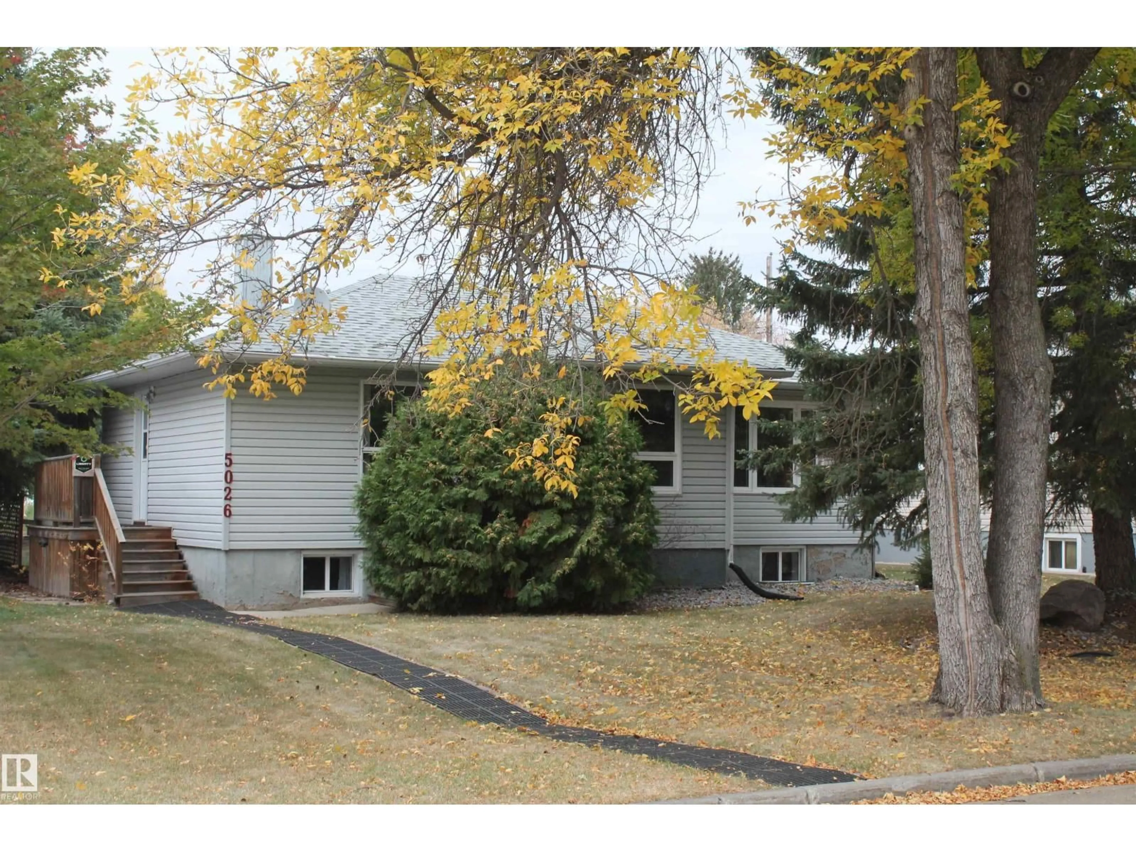 Home with vinyl exterior material, street for 5026 47 ST, Daysland Alberta T0B1A0