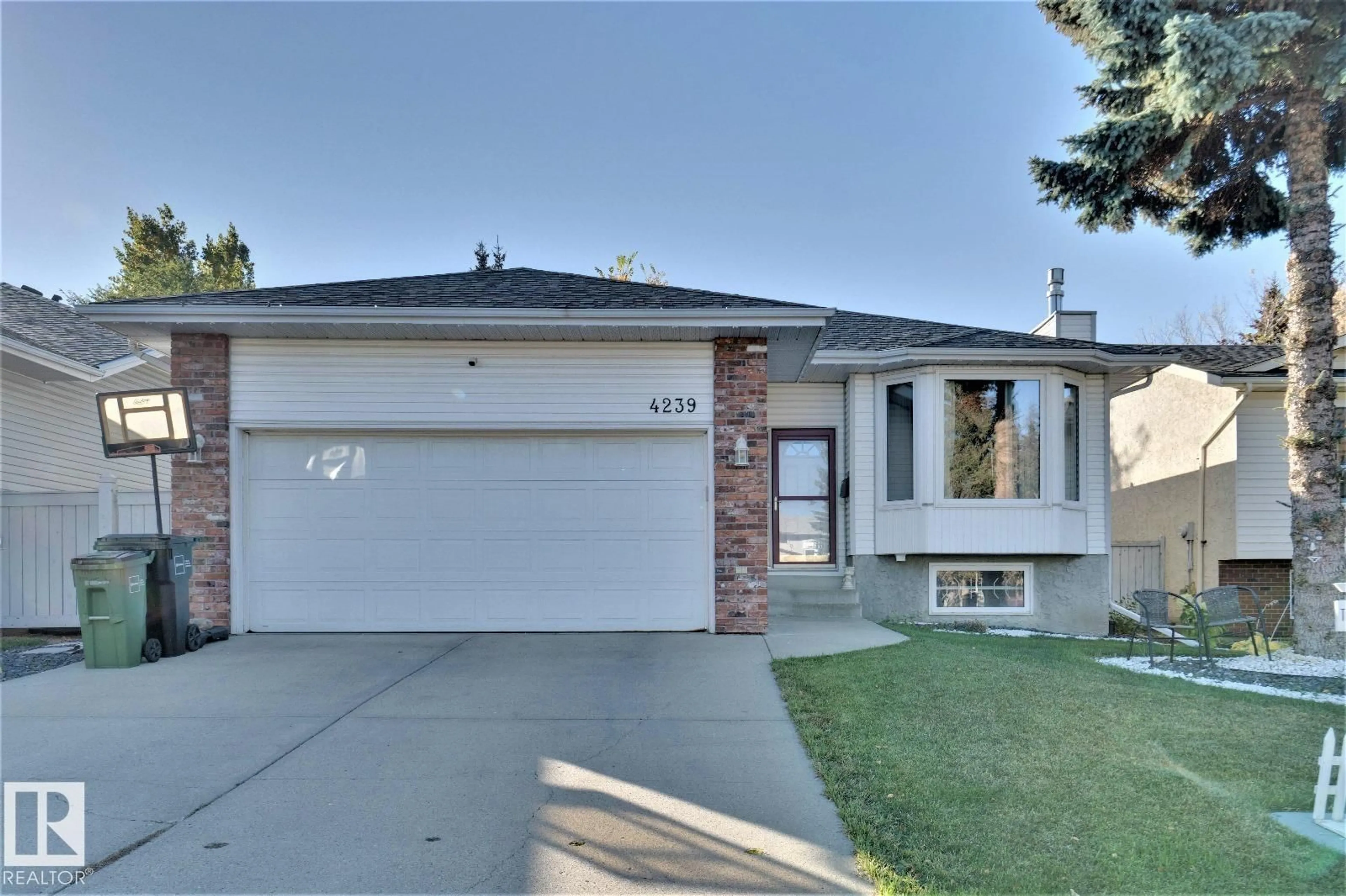 Home with brick exterior material, street for 4239 29 AV, Edmonton Alberta T6L5K3