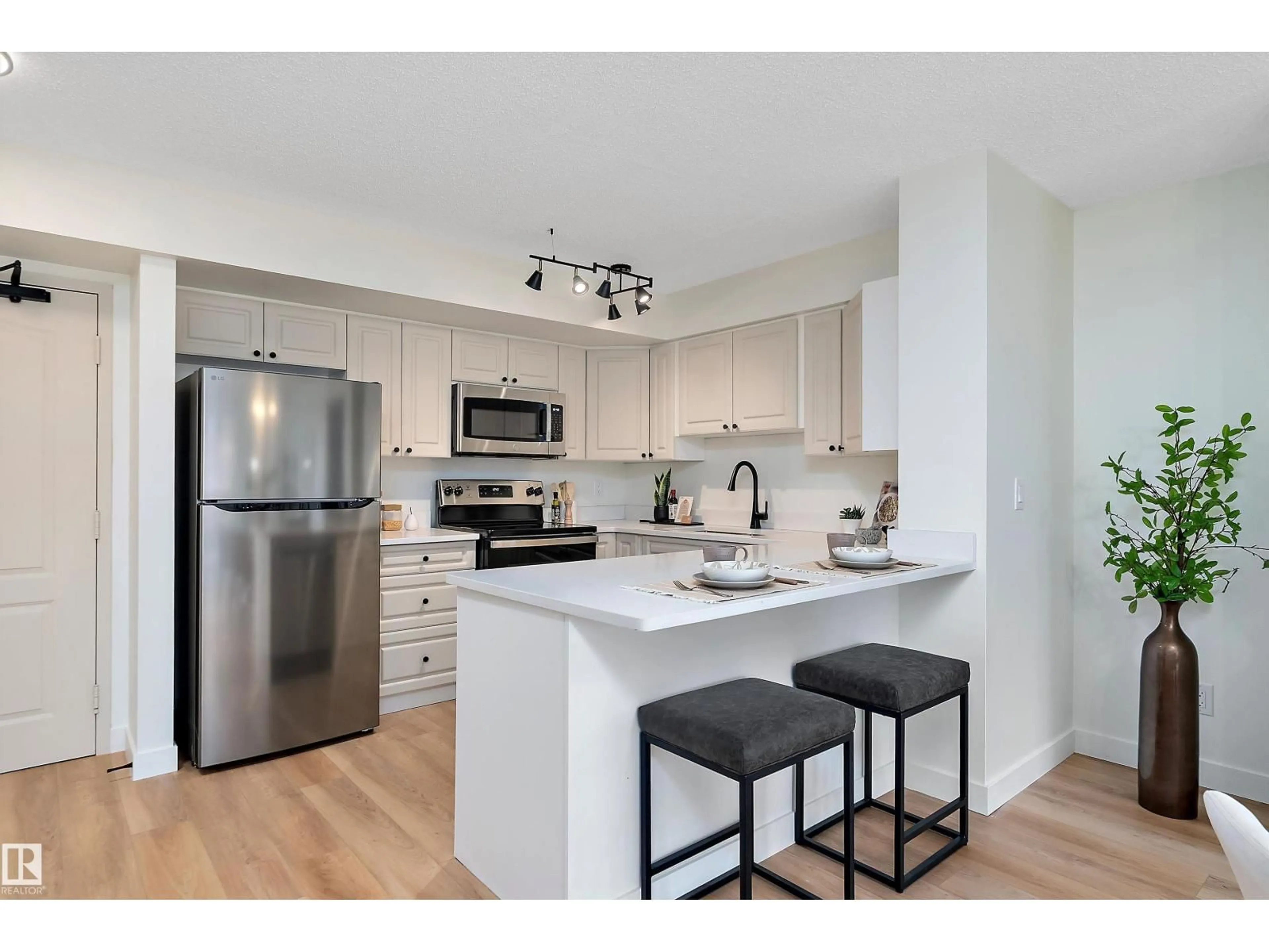 Open concept kitchen, unknown for 10909 103 AV, Edmonton Alberta T5K2W7