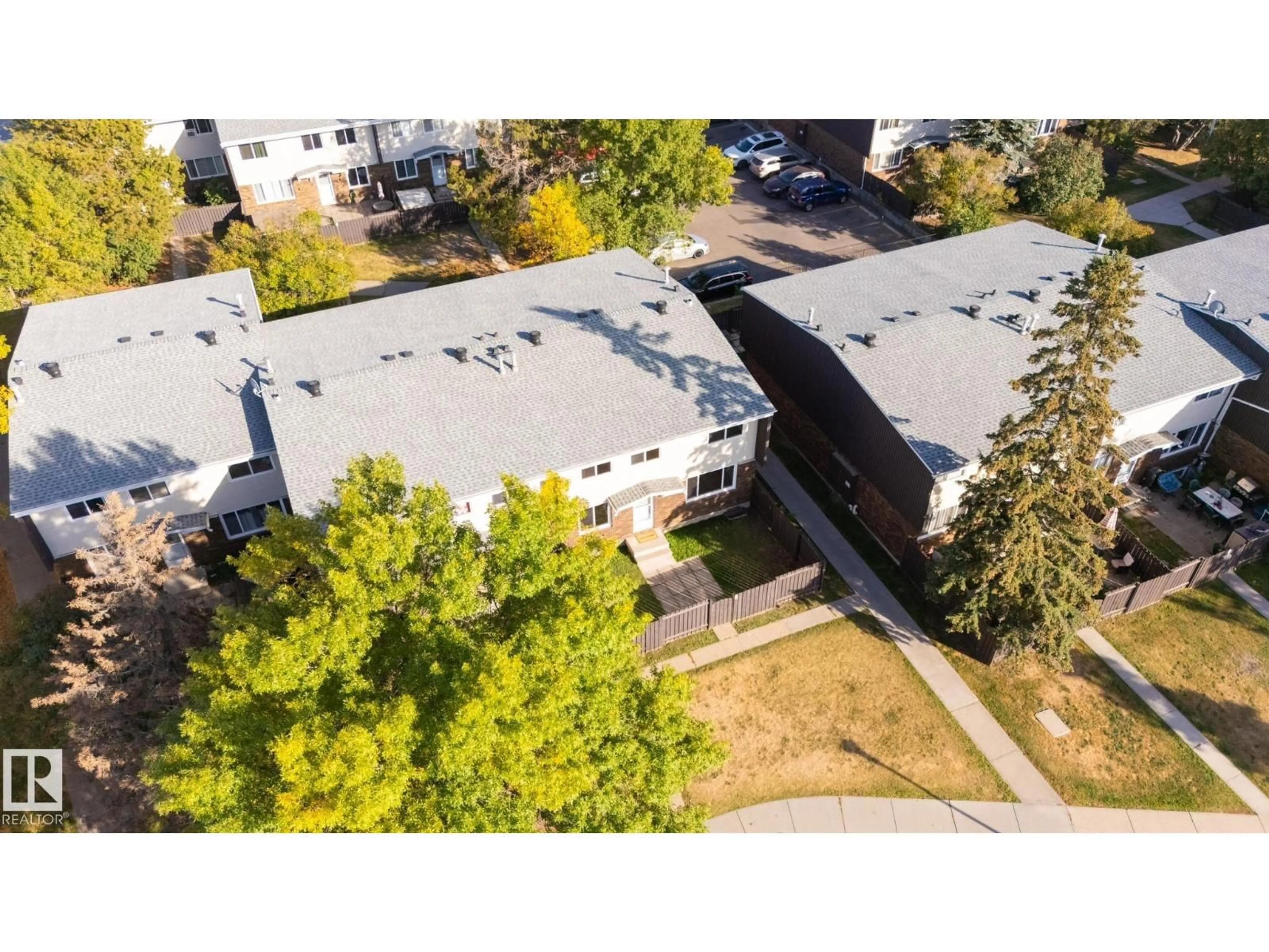 A pic from outside/outdoor area/front of a property/back of a property/a pic from drone, unknown for NW - 193 ROSELAND VG, Edmonton Alberta T5E5R6