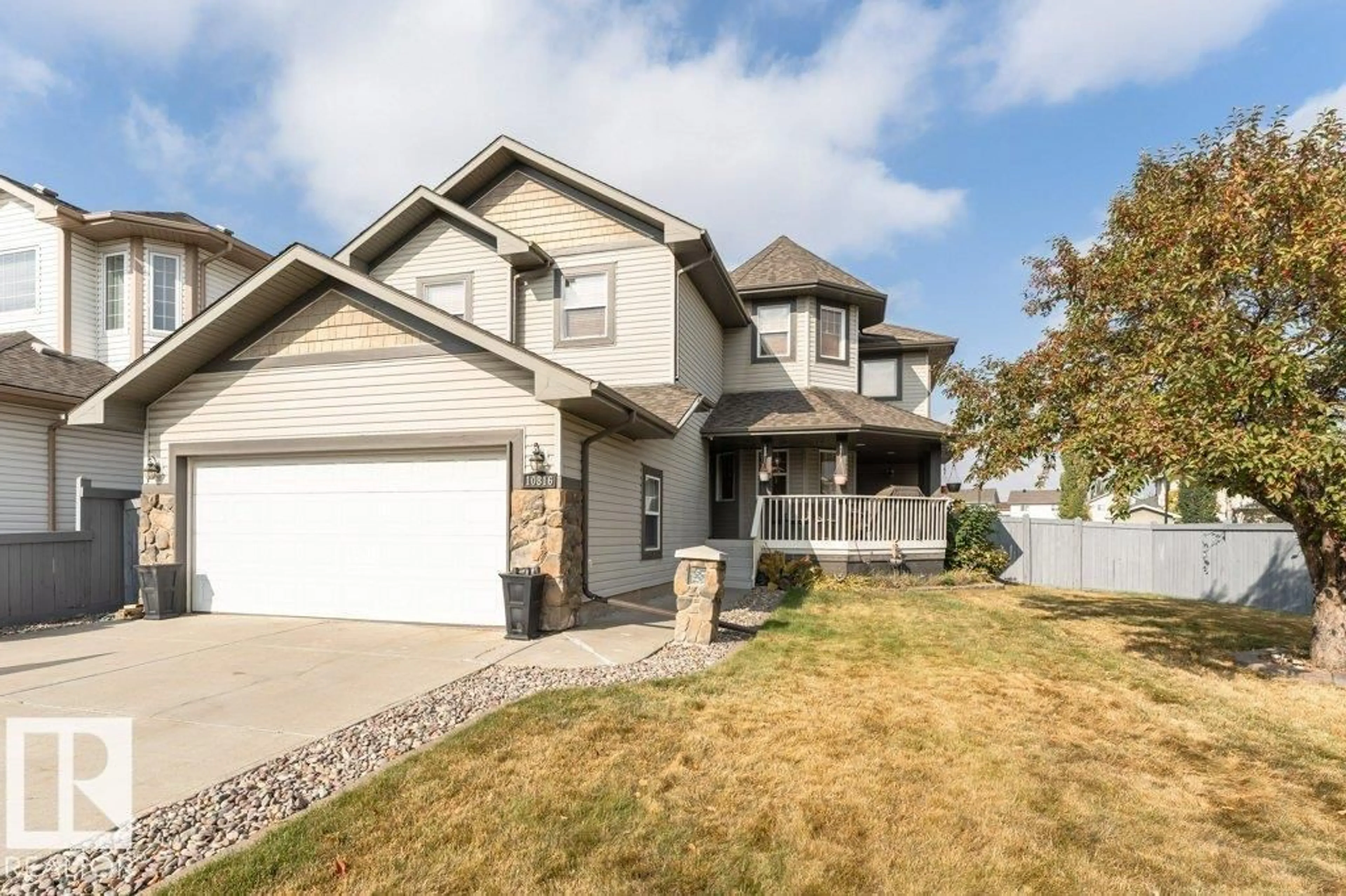 Home with vinyl exterior material, street for 10816 178 AV, Edmonton Alberta T5X6H6