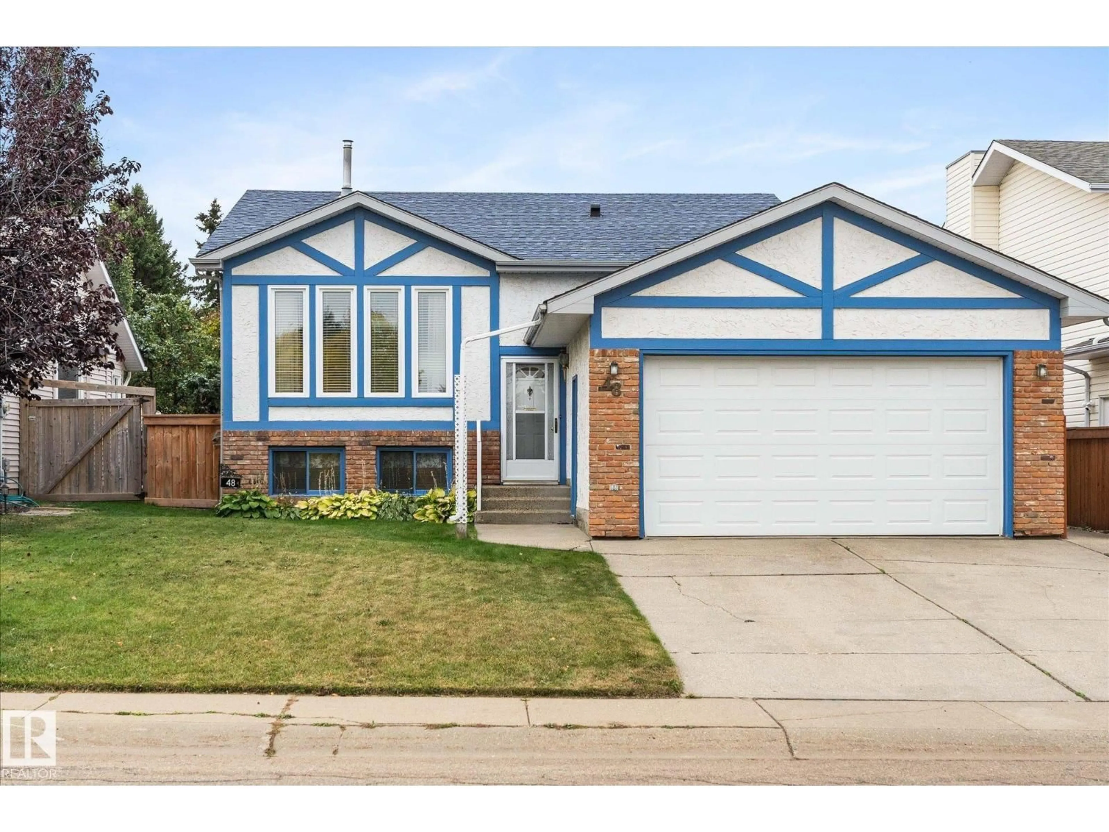 Home with vinyl exterior material, street for 48 MCKEAN WY, Spruce Grove Alberta T7X2S1
