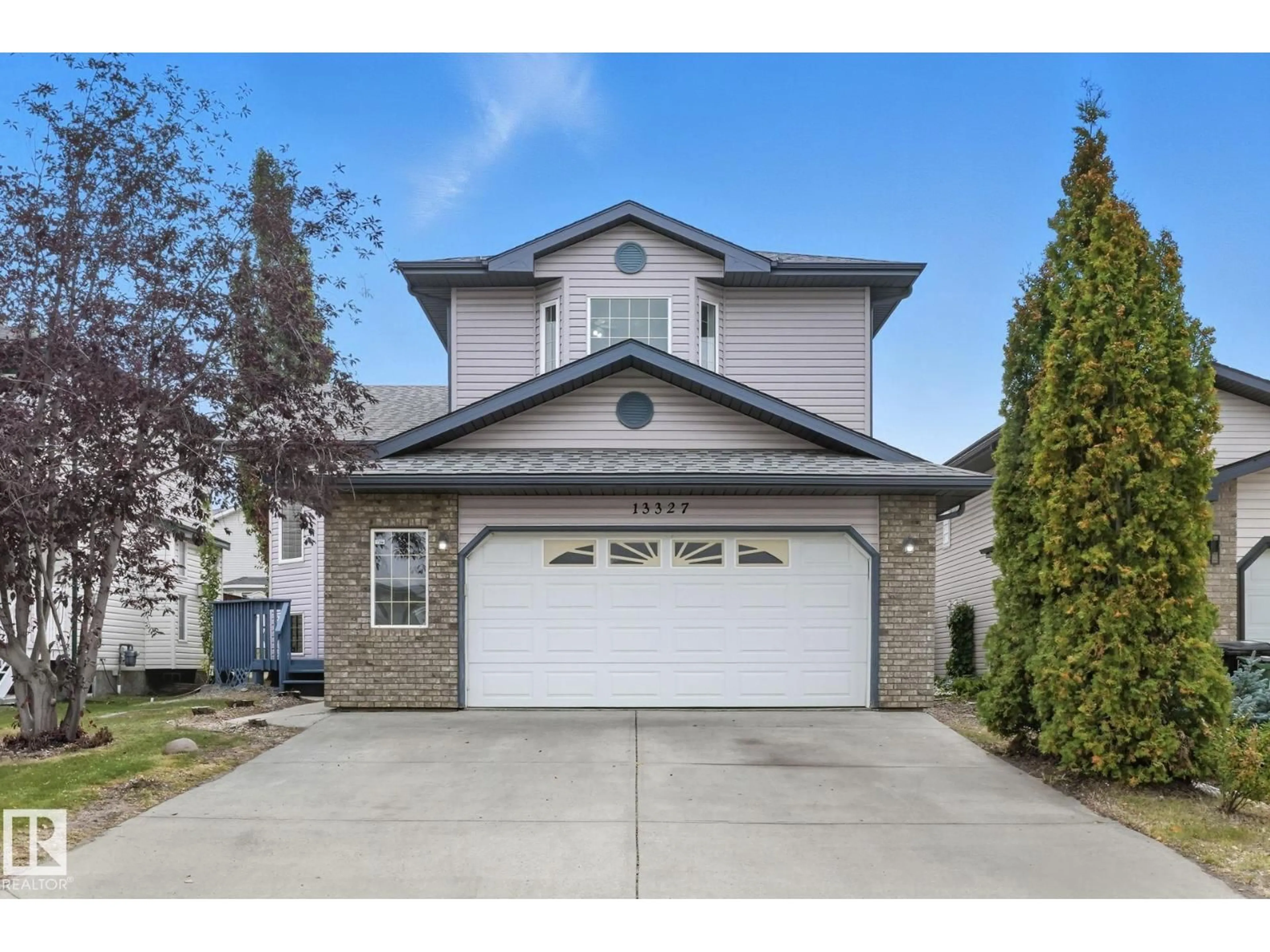 Home with vinyl exterior material, street for 13327 155 AV, Edmonton Alberta T6V0B8