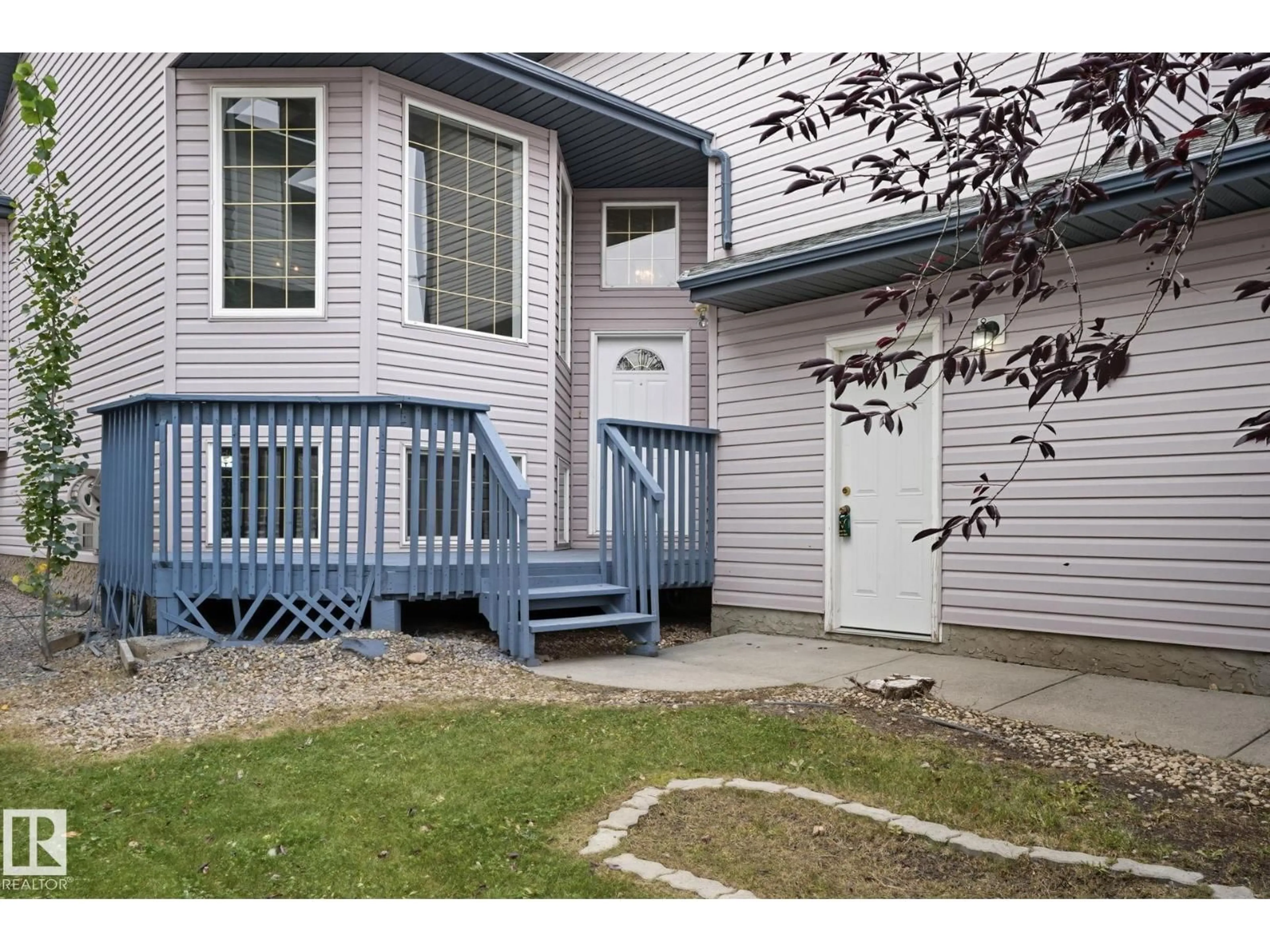 Home with vinyl exterior material, street for 13327 155 AV, Edmonton Alberta T6V0B8