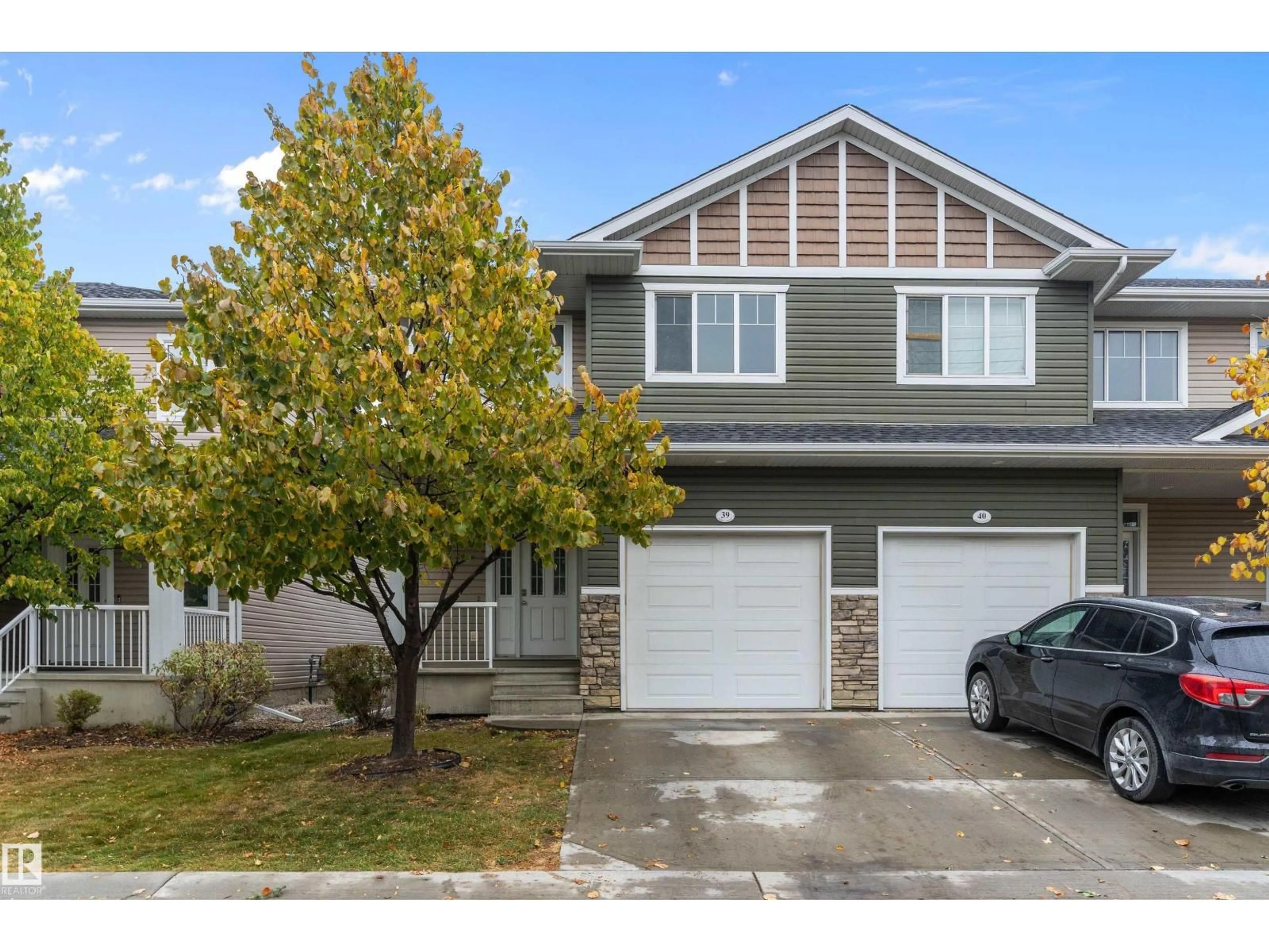 Home with vinyl exterior material, street for 39 18230 104A ST NW, Edmonton Alberta T5X0G9