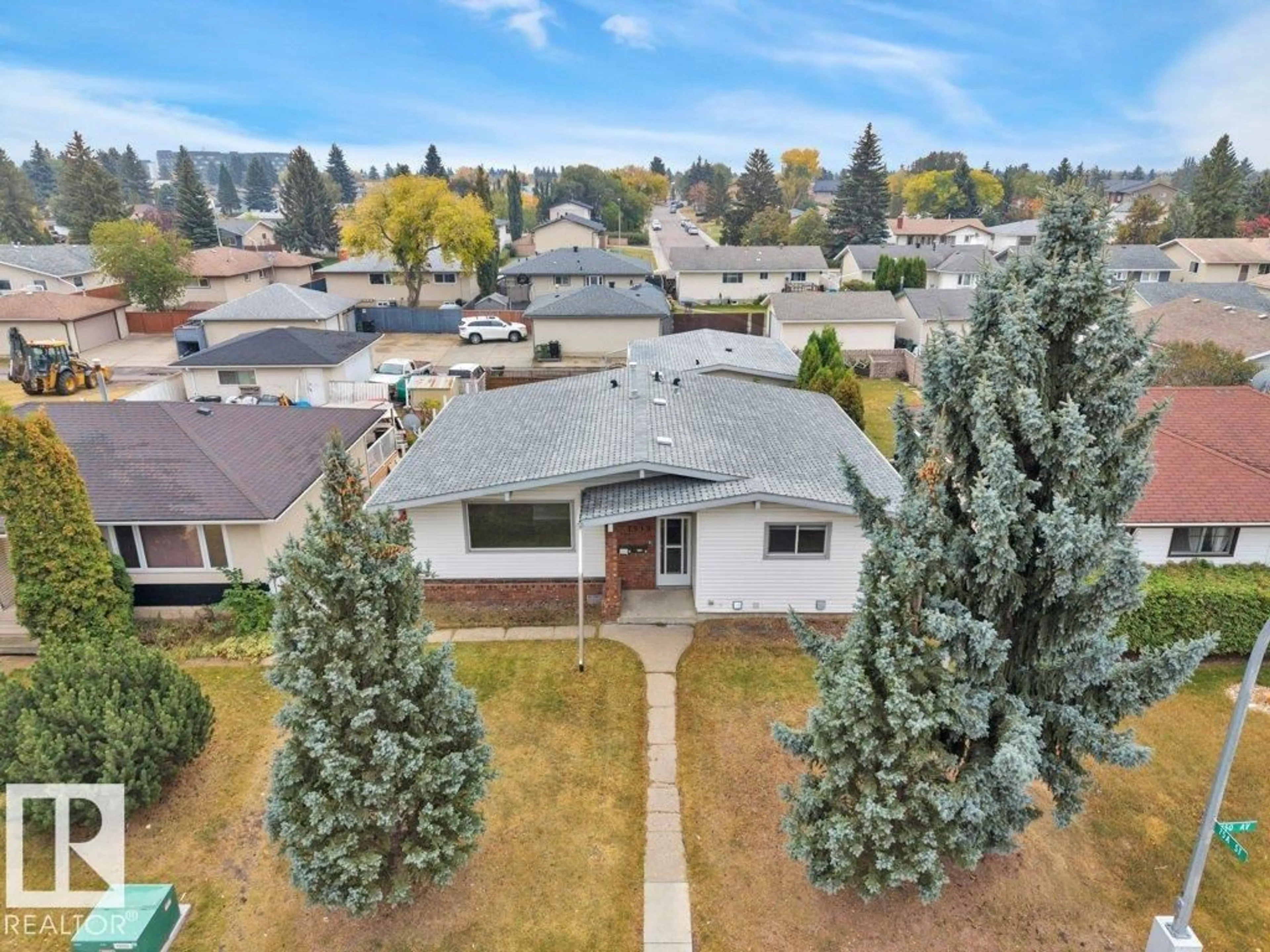 A pic from outside/outdoor area/front of a property/back of a property/a pic from drone, street for 7519 150 AV, Edmonton Alberta T5C2Y2