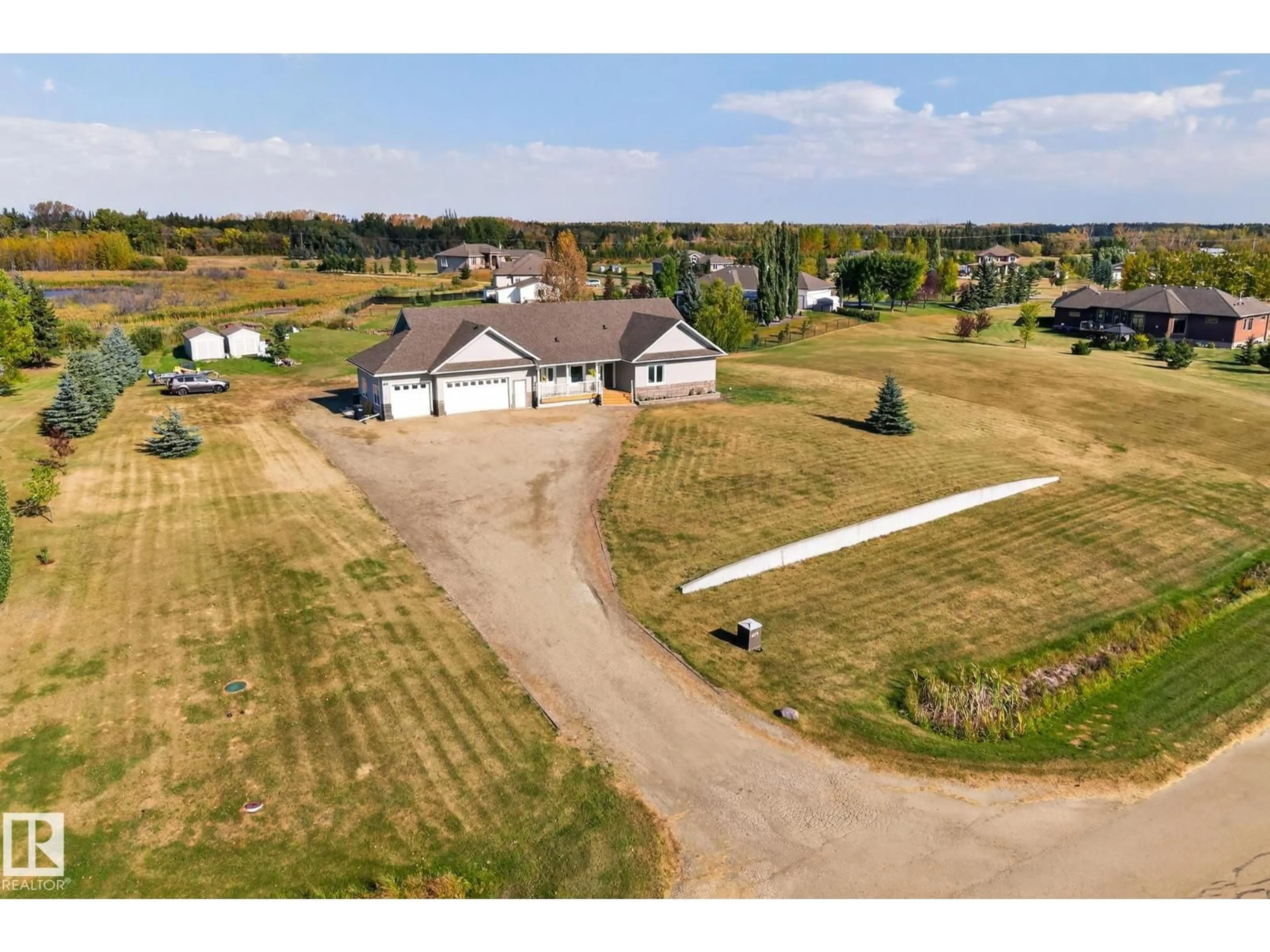 A pic from outside/outdoor area/front of a property/back of a property/a pic from drone, unknown for 470 52358 RGE ROAD 225, Rural Strathcona County Alberta T8C1C7