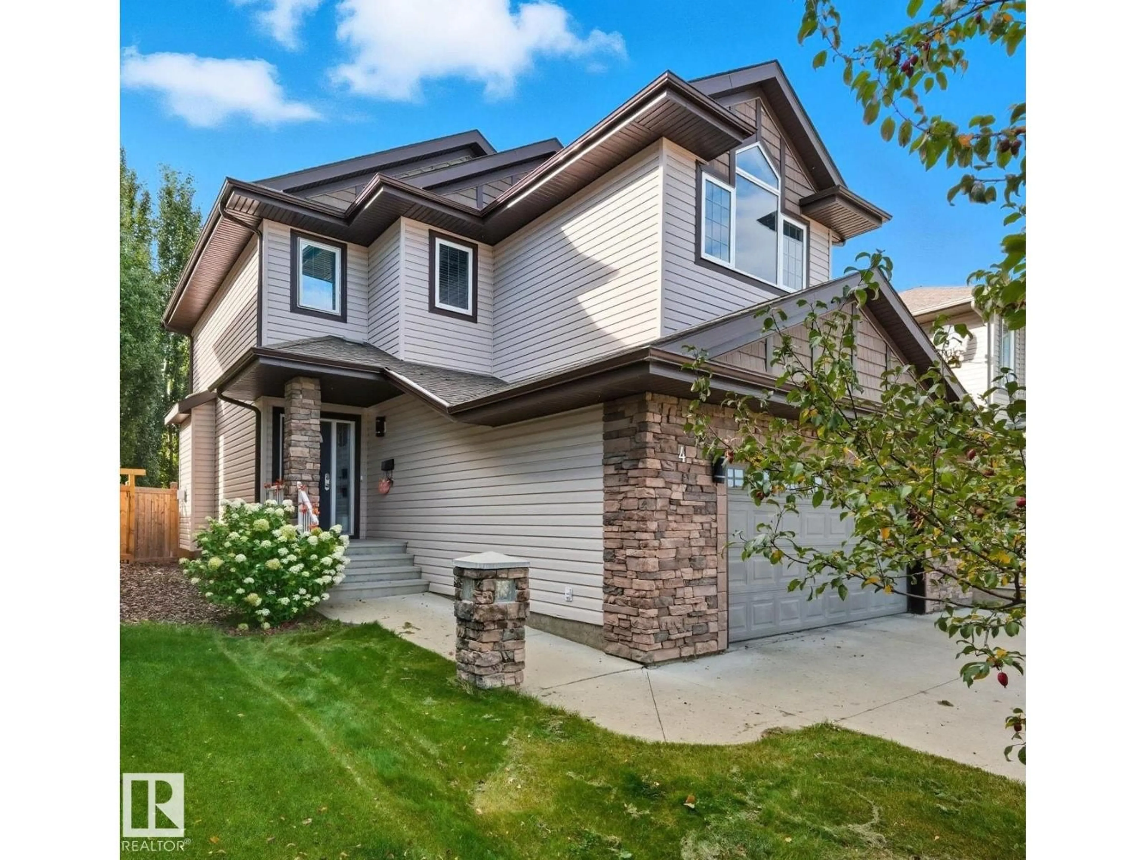 Home with vinyl exterior material, street for 4 BRASSARD CO, Beaumont Alberta T4X0E7