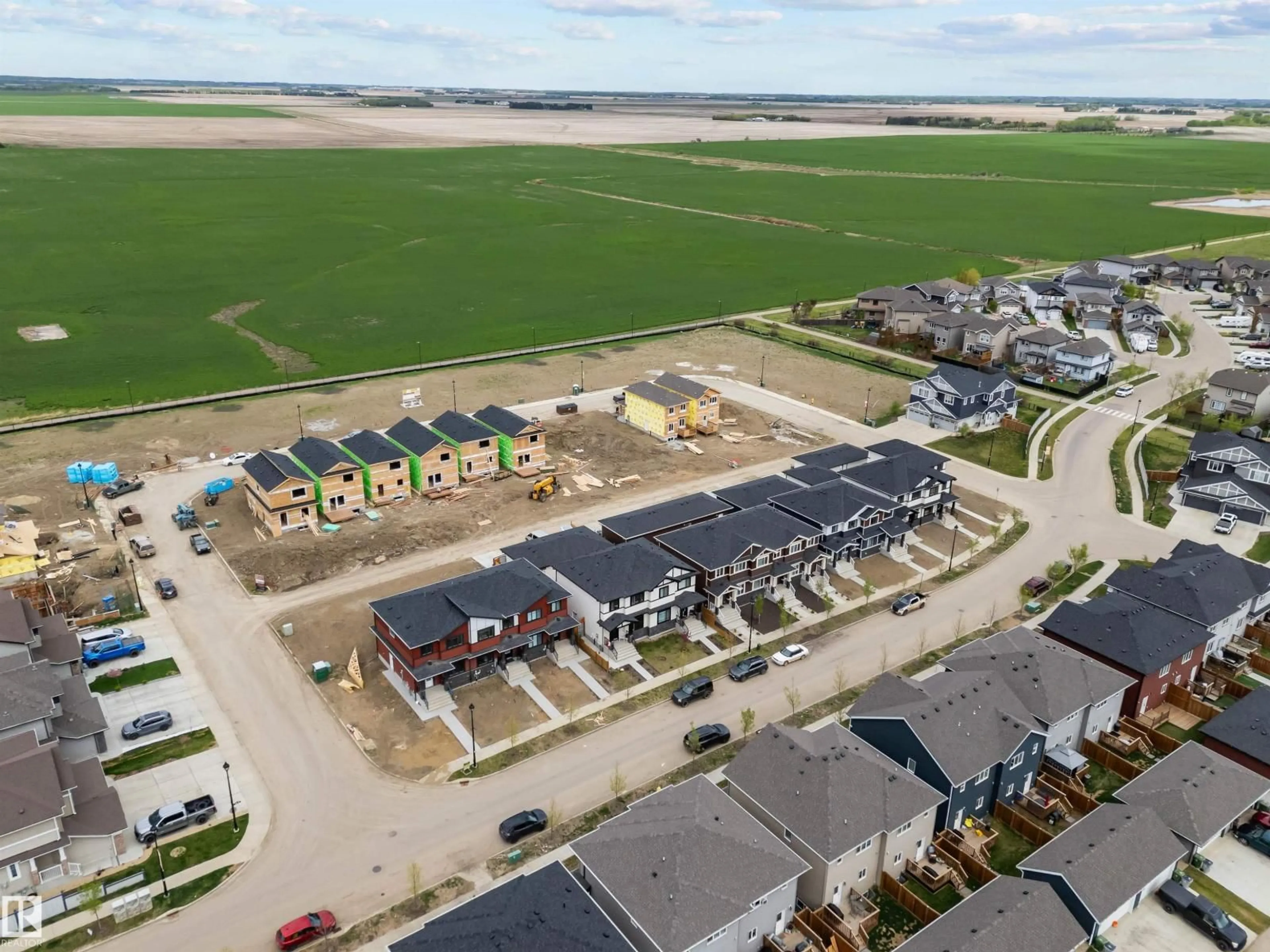 A pic from outside/outdoor area/front of a property/back of a property/a pic from drone, street for 9905 107 AV, Morinville Alberta T8R2P1