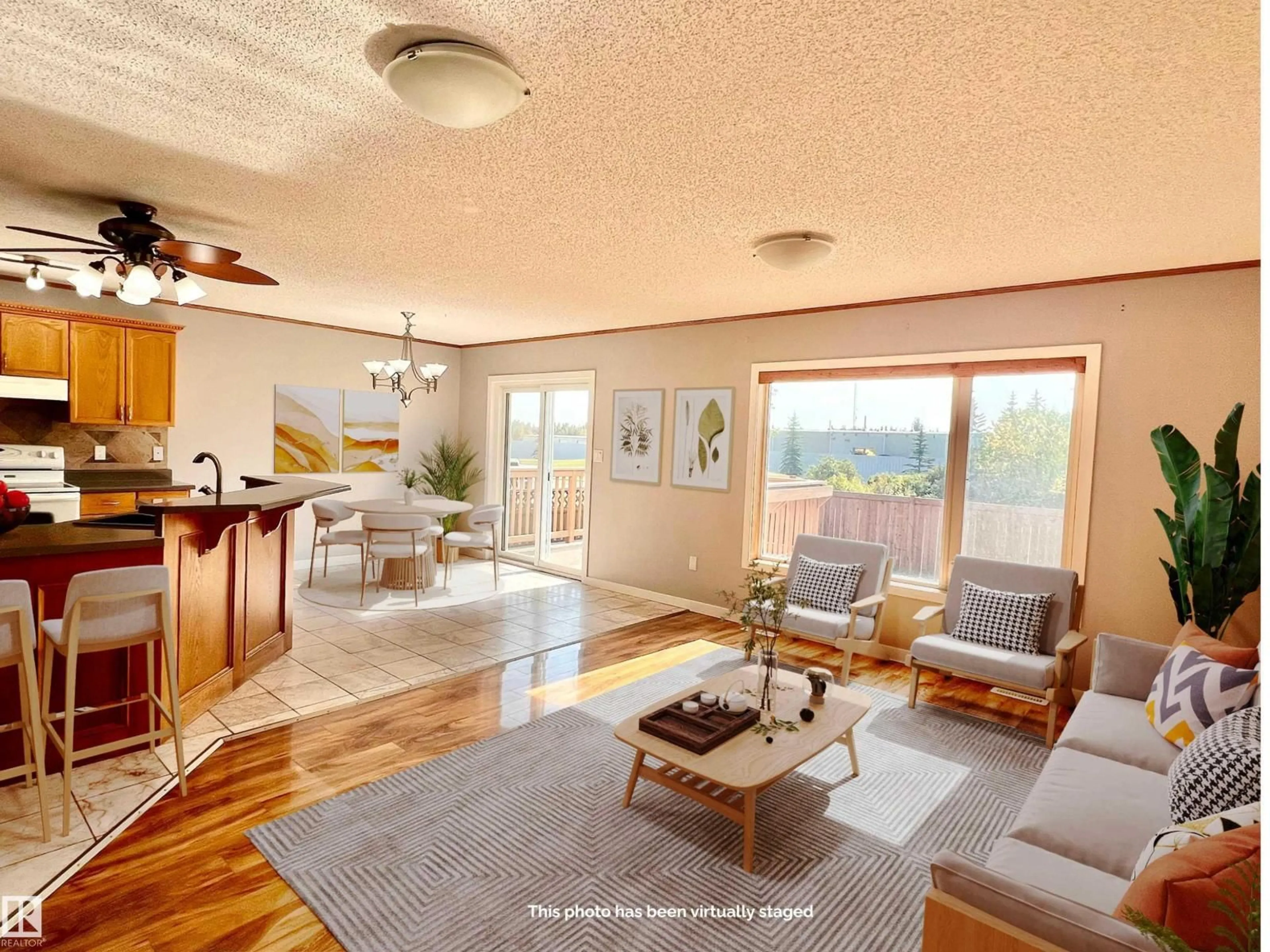 Living room with furniture, wood/laminate floor for 806 HIGHWOOD BV, Devon Alberta T9G2G6