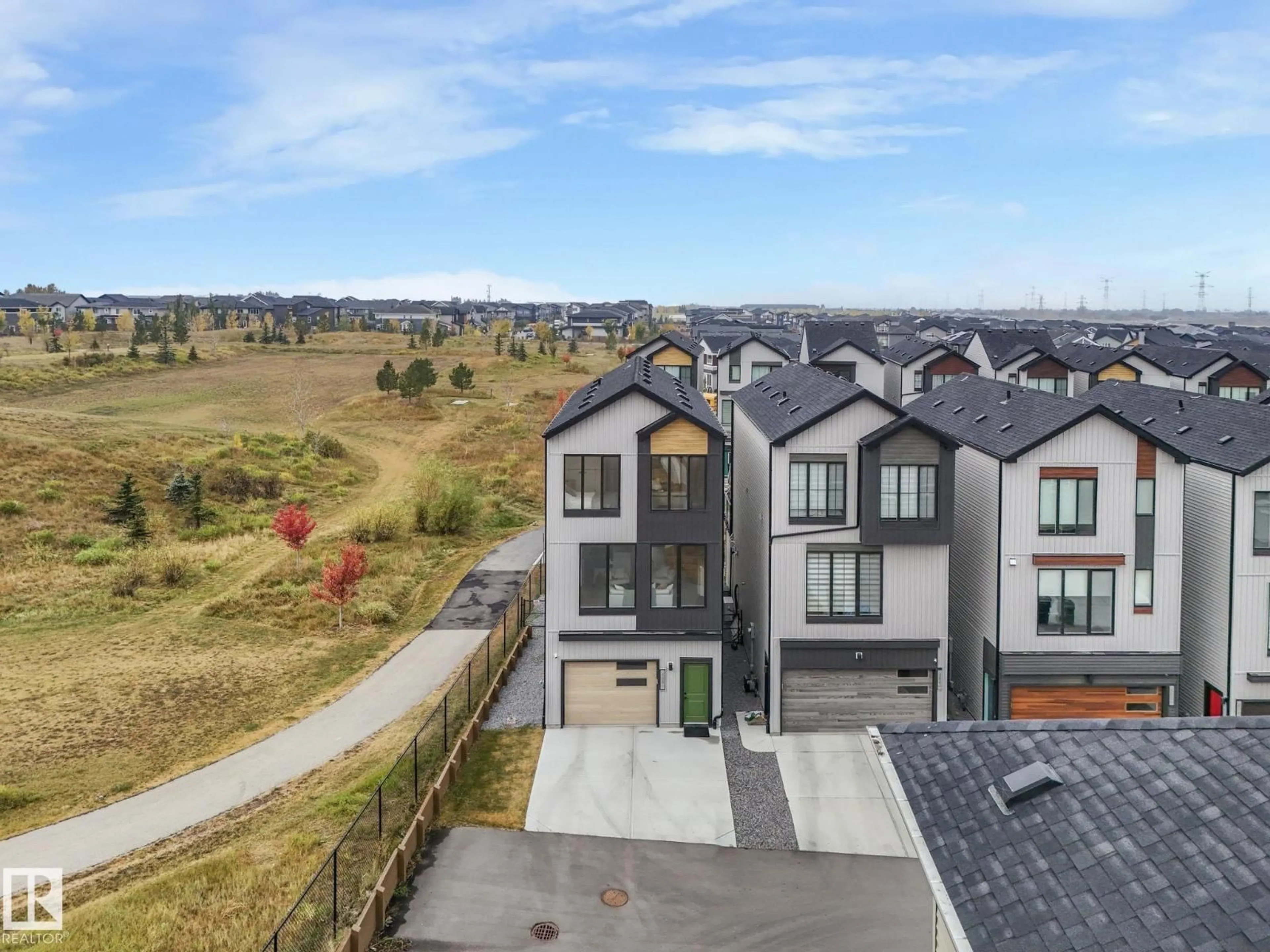 A pic from outside/outdoor area/front of a property/back of a property/a pic from drone, mountain view for SW - 488 38A ST, Edmonton Alberta T6X2X9