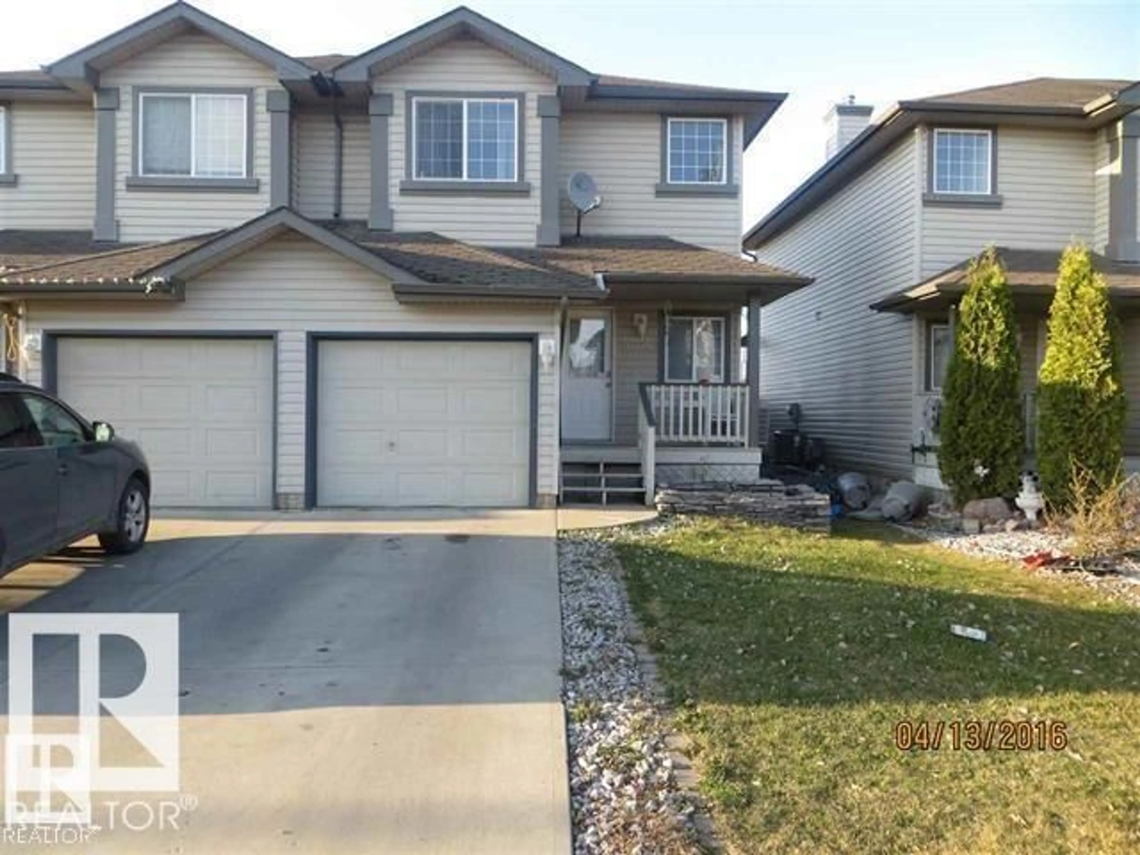 Home with vinyl exterior material, street for SW - 8016 2 AV, Edmonton Alberta T6X1K3