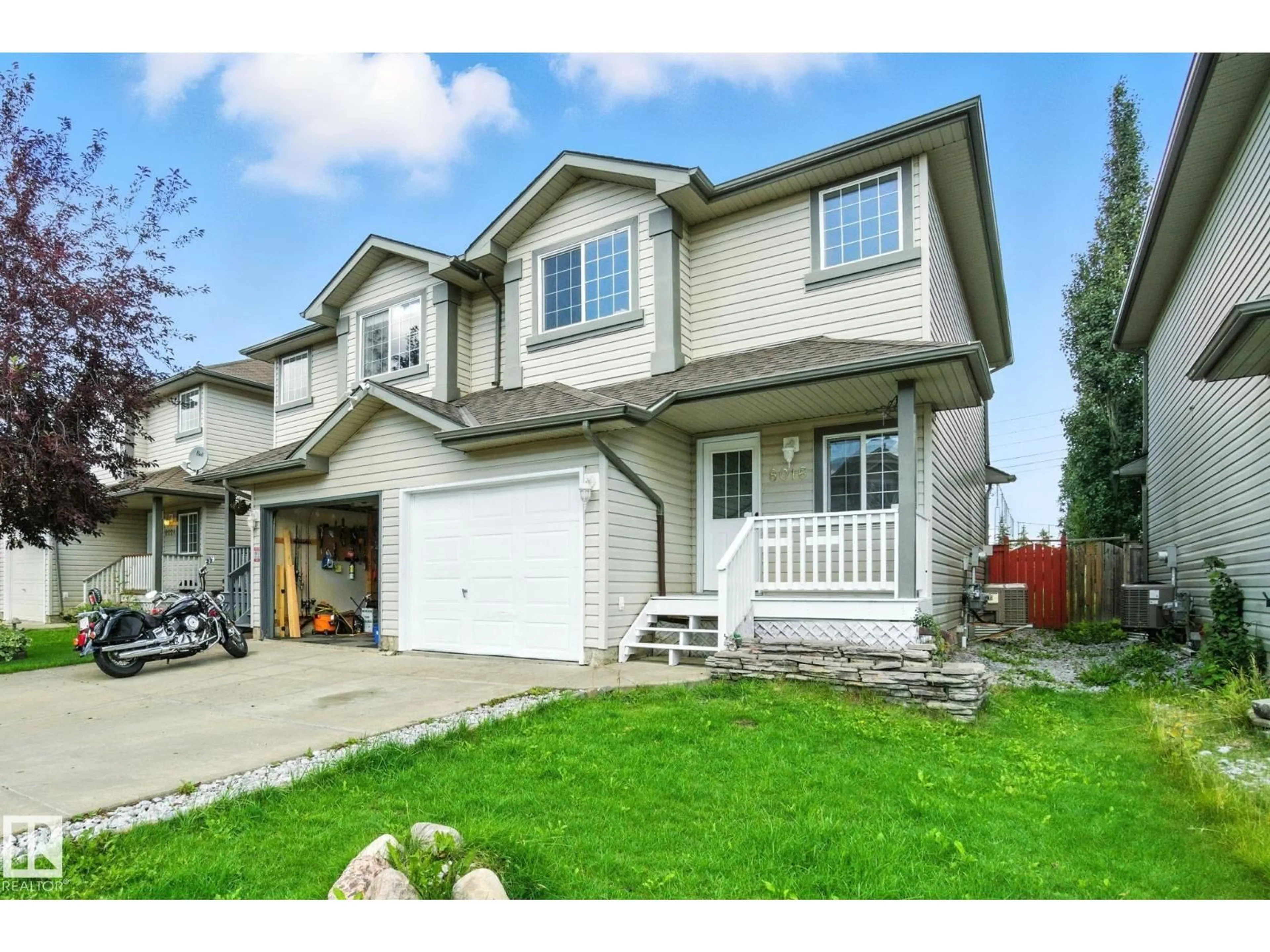 Home with vinyl exterior material, street for SW - 8016 2 AV, Edmonton Alberta T6X1K3