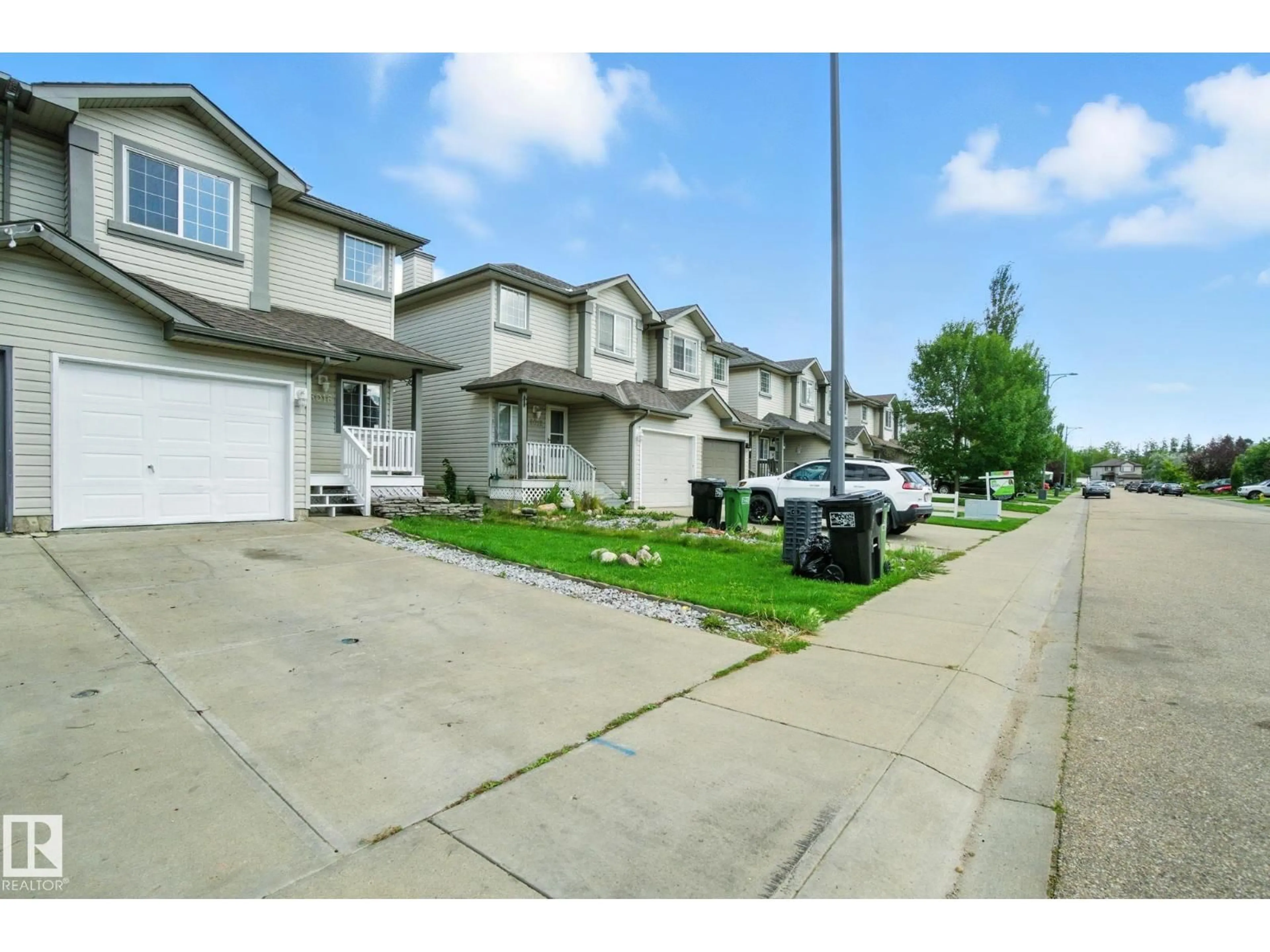 A pic from outside/outdoor area/front of a property/back of a property/a pic from drone, street for SW - 8016 2 AV, Edmonton Alberta T6X1K3