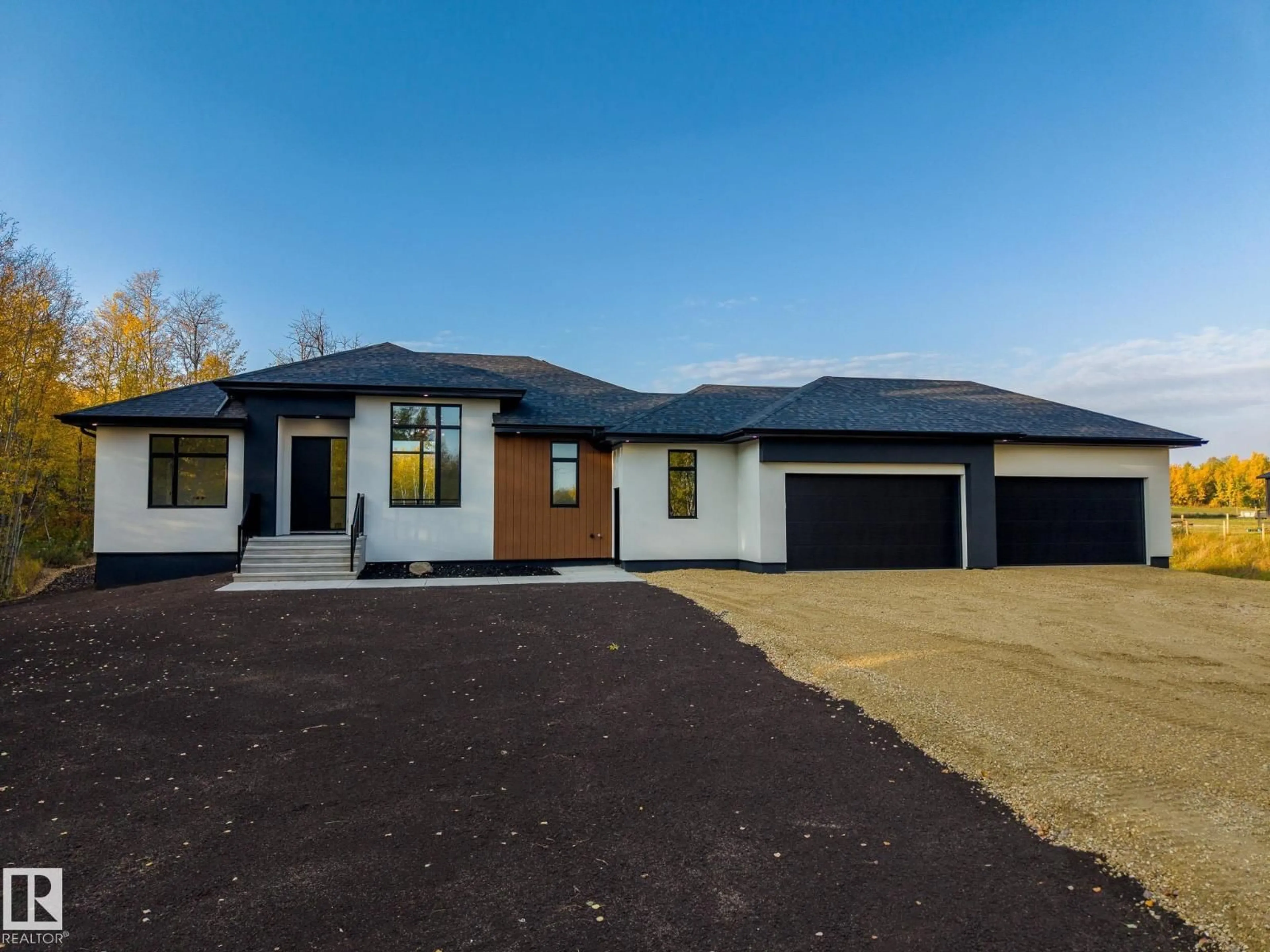 A pic from outside/outdoor area/front of a property/back of a property/a pic from drone, street for 225 RGE RD 205, Rural Camrose County Alberta T0B2M1