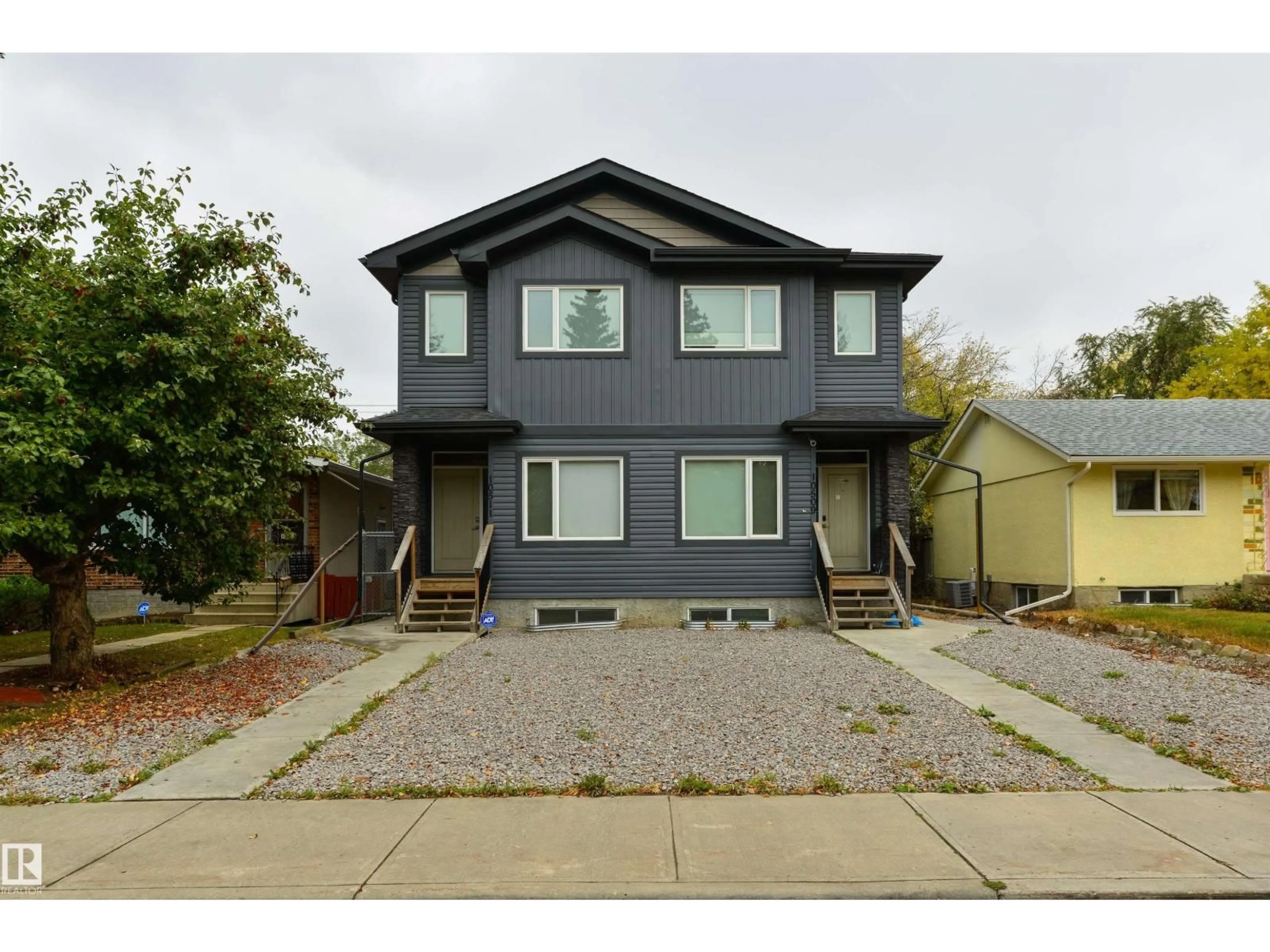 Home with vinyl exterior material, street for NW - 10511 154 ST, Edmonton Alberta T5P2J1