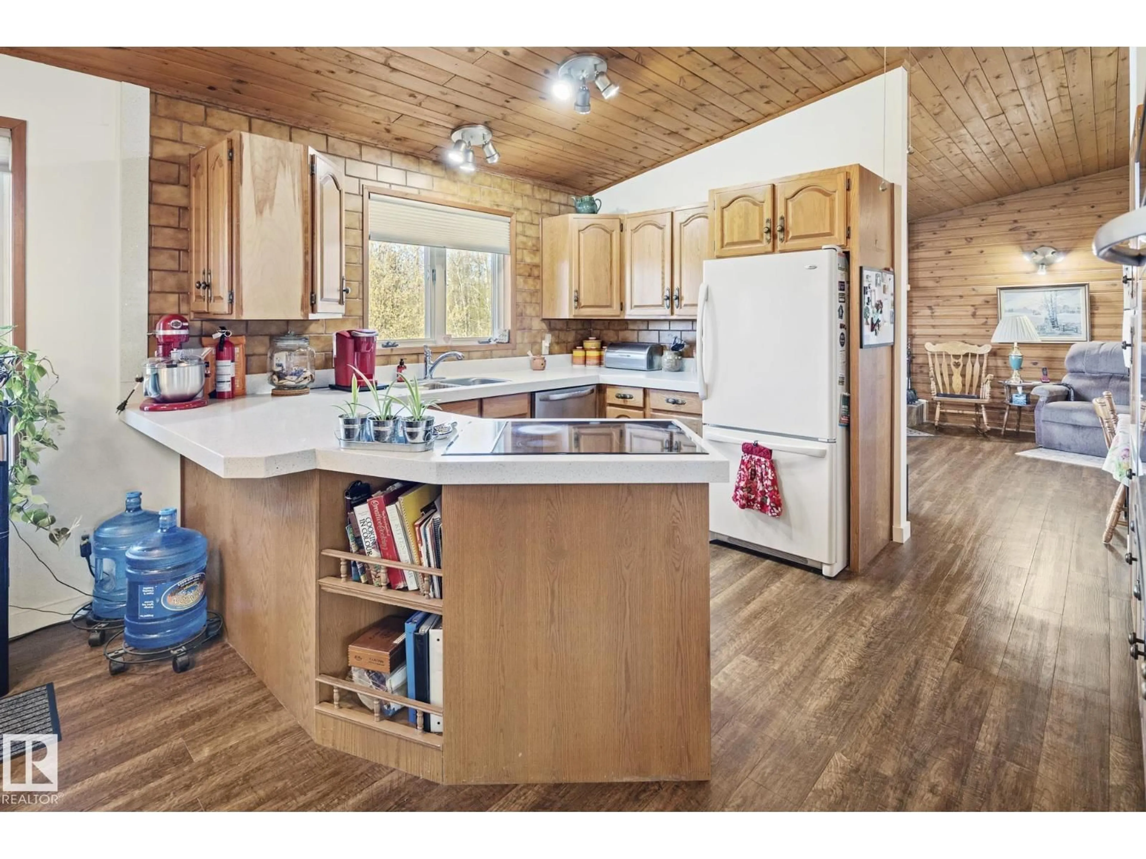 Open concept kitchen, wood/laminate floor for 56420 - 19 RGE ROAD 231 RGE ROAD, Rural Sturgeon County Alberta T0A1N4