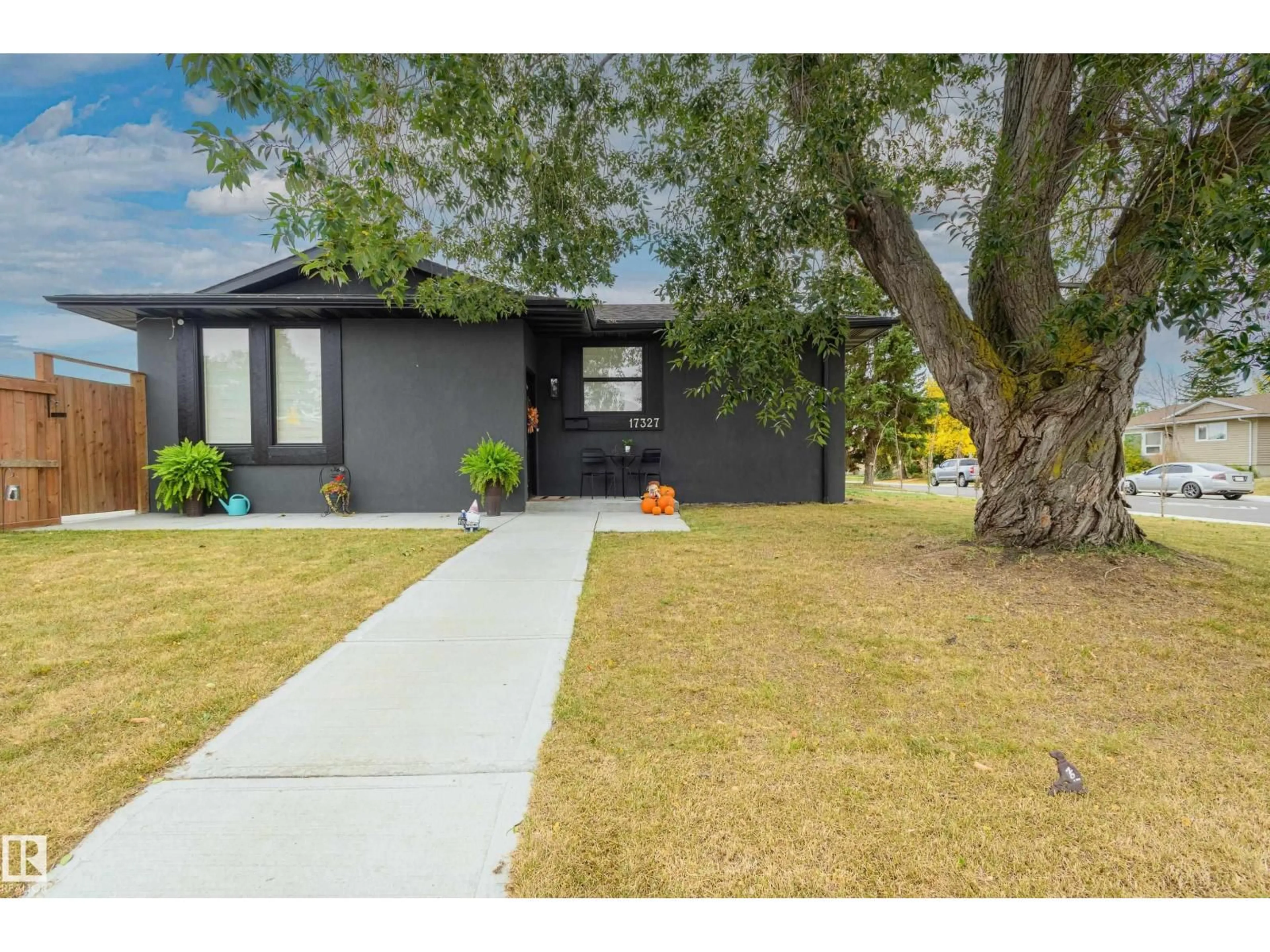Home with vinyl exterior material, street for 17327 106 ST, Edmonton Alberta T5X3W9