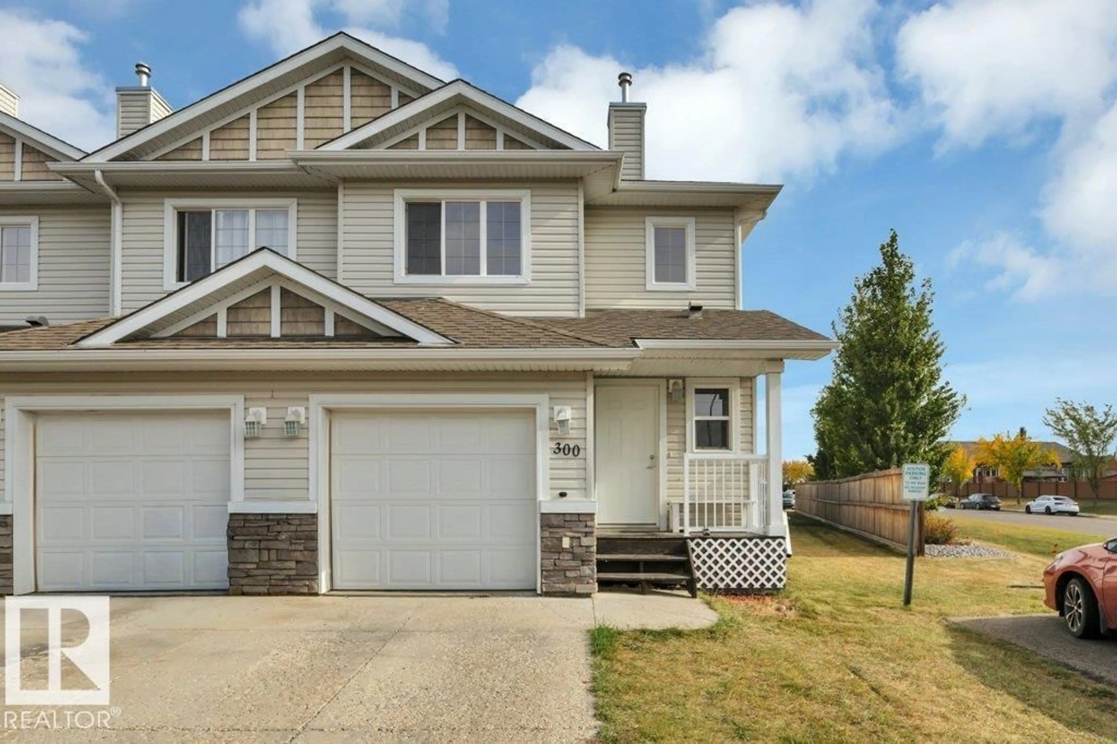 Home with vinyl exterior material, street for 300 GRAYWOOD ME, Stony Plain Alberta T7Z0C2