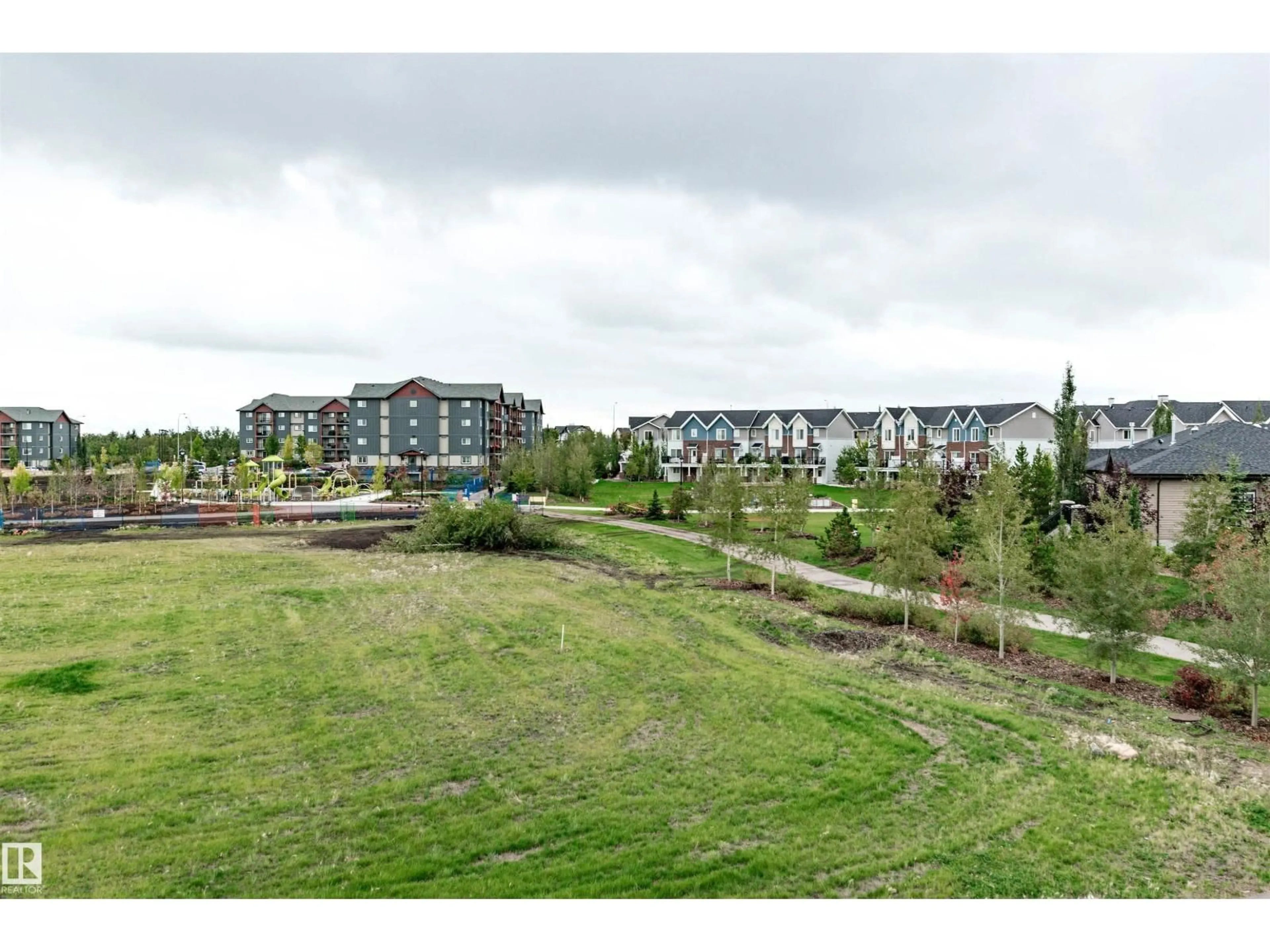 A pic from outside/outdoor area/front of a property/back of a property/a pic from drone, water/lake/river/ocean view for #410 - 5001 ETON BV, Sherwood Park Alberta T8H0N7