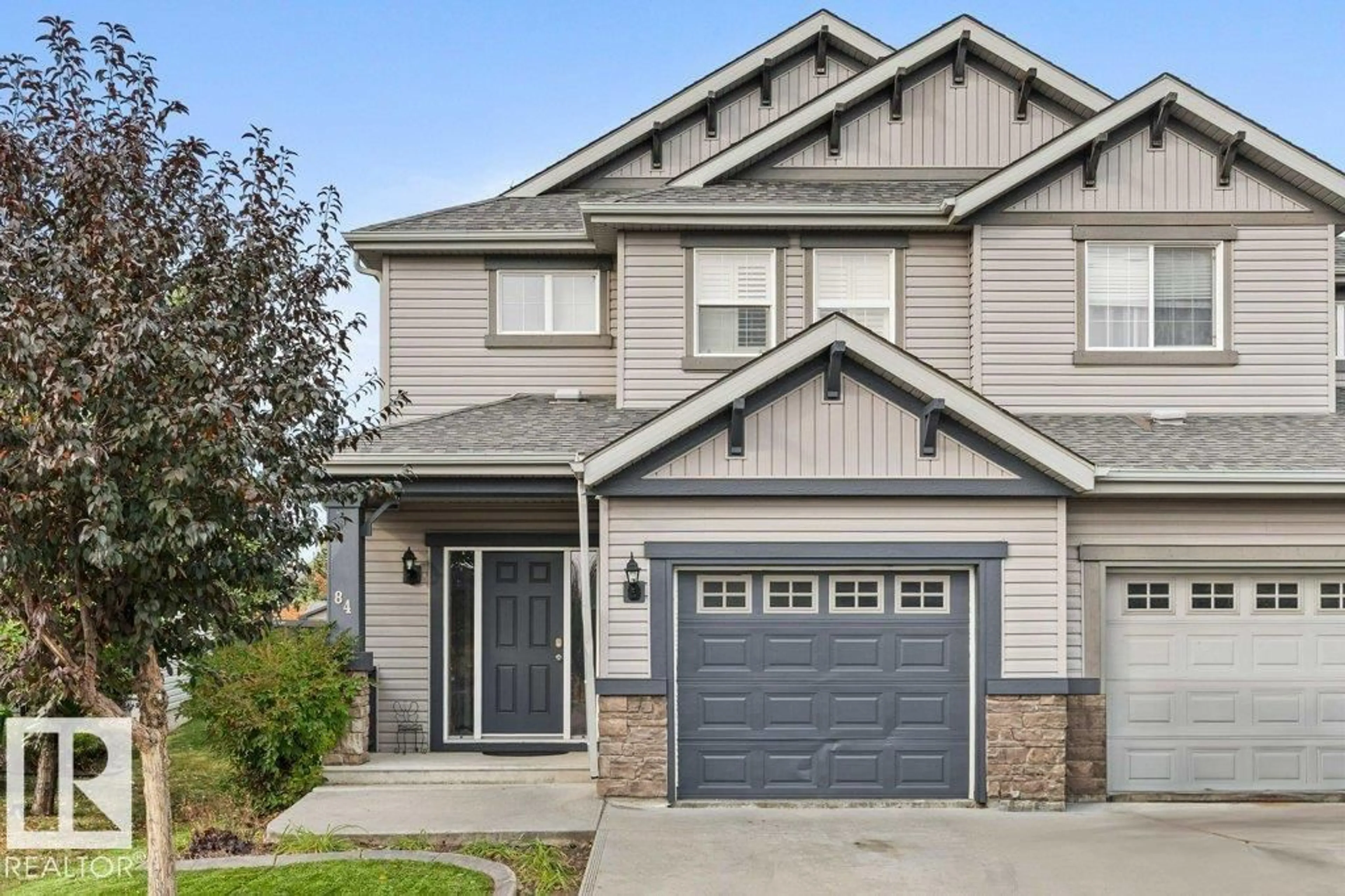 Home with vinyl exterior material, street for 84 CALVERT WD, Fort Saskatchewan Alberta T8L0C4