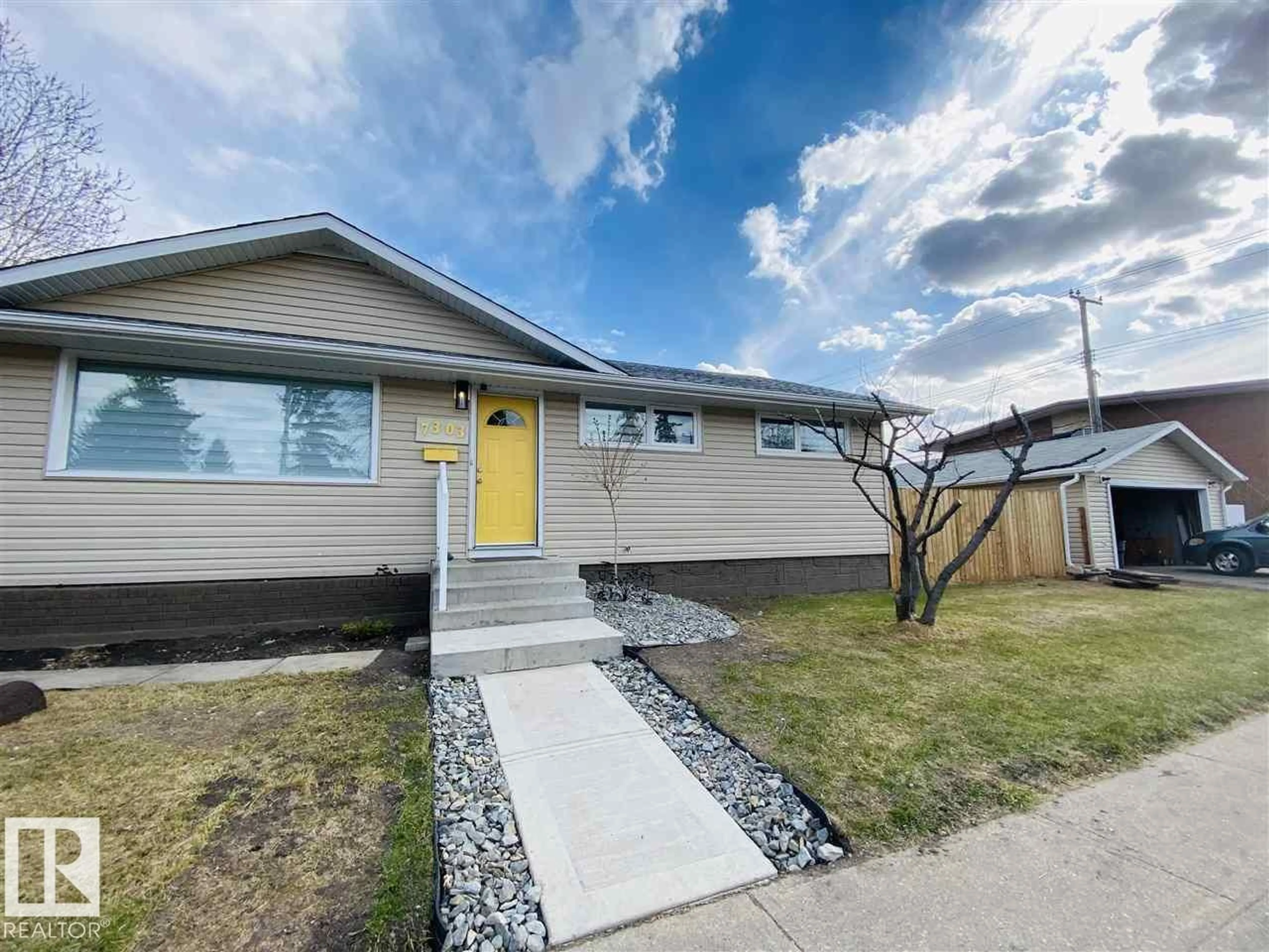 Home with vinyl exterior material, street for NW - 7303 90 AV, Edmonton Alberta T6B0P6