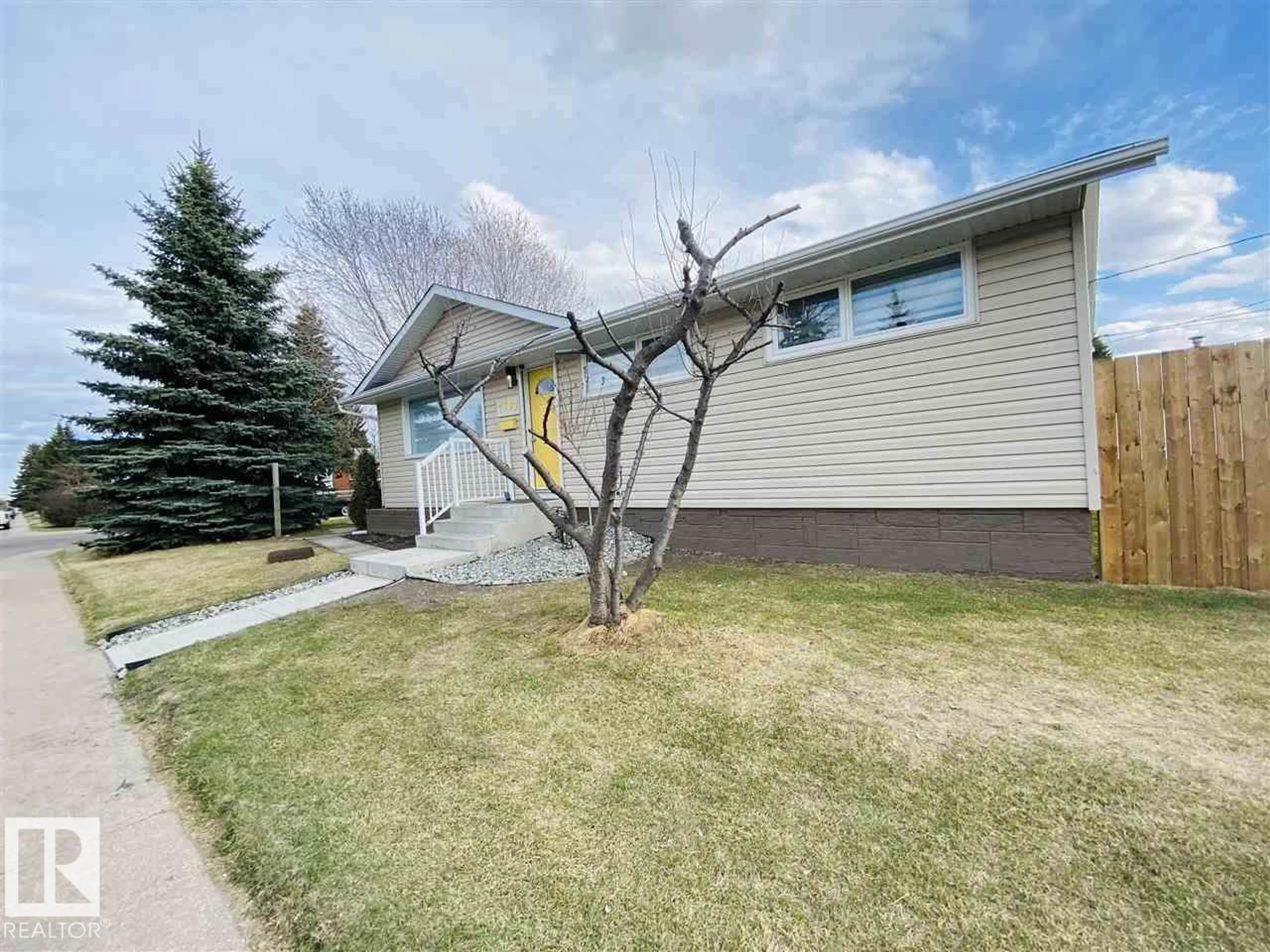 Home with vinyl exterior material, street for NW - 7303 90 AV, Edmonton Alberta T6B0P6