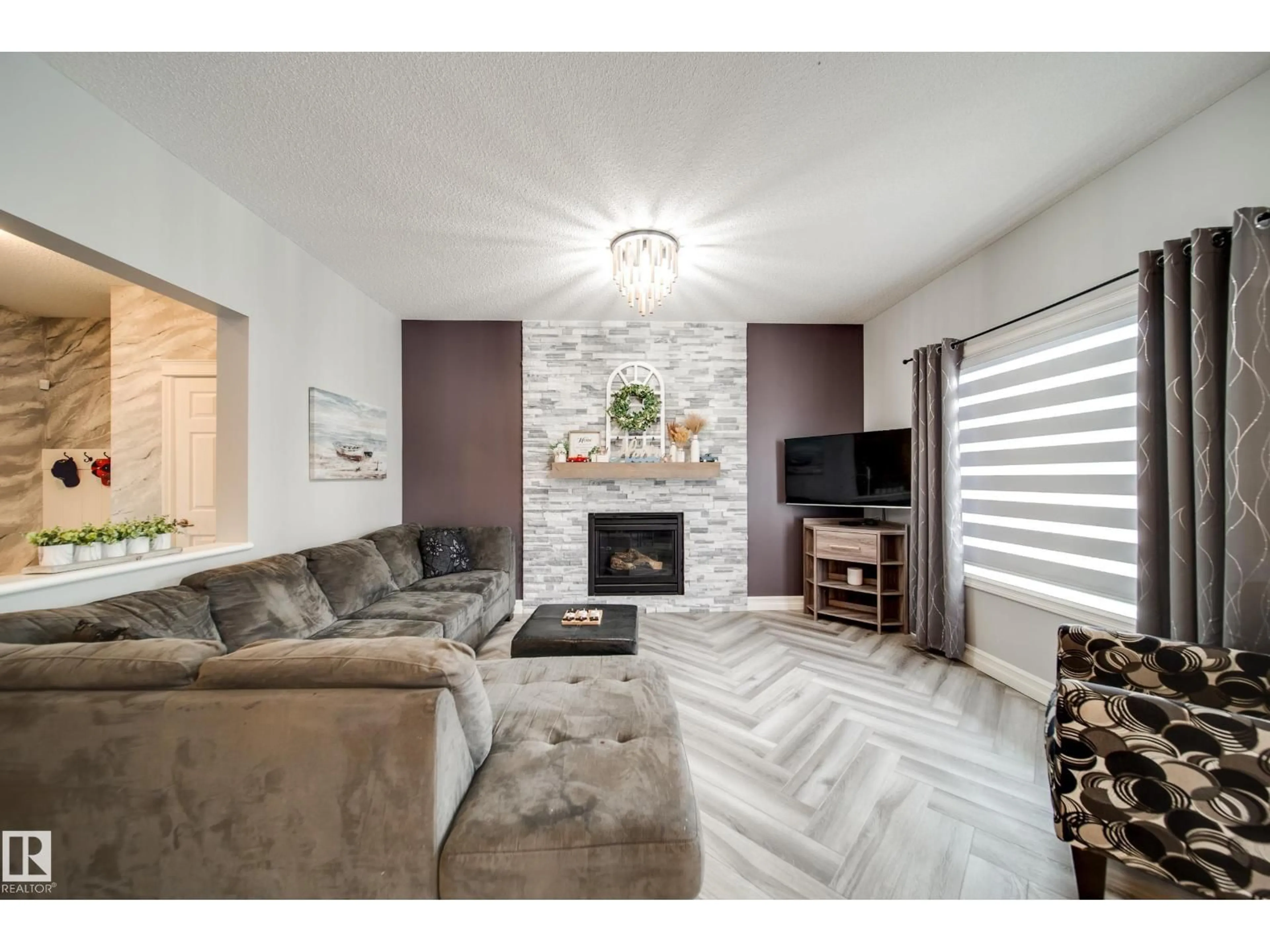 Living room with furniture, unknown for 5927 6 AV, Edmonton Alberta T6X0G4