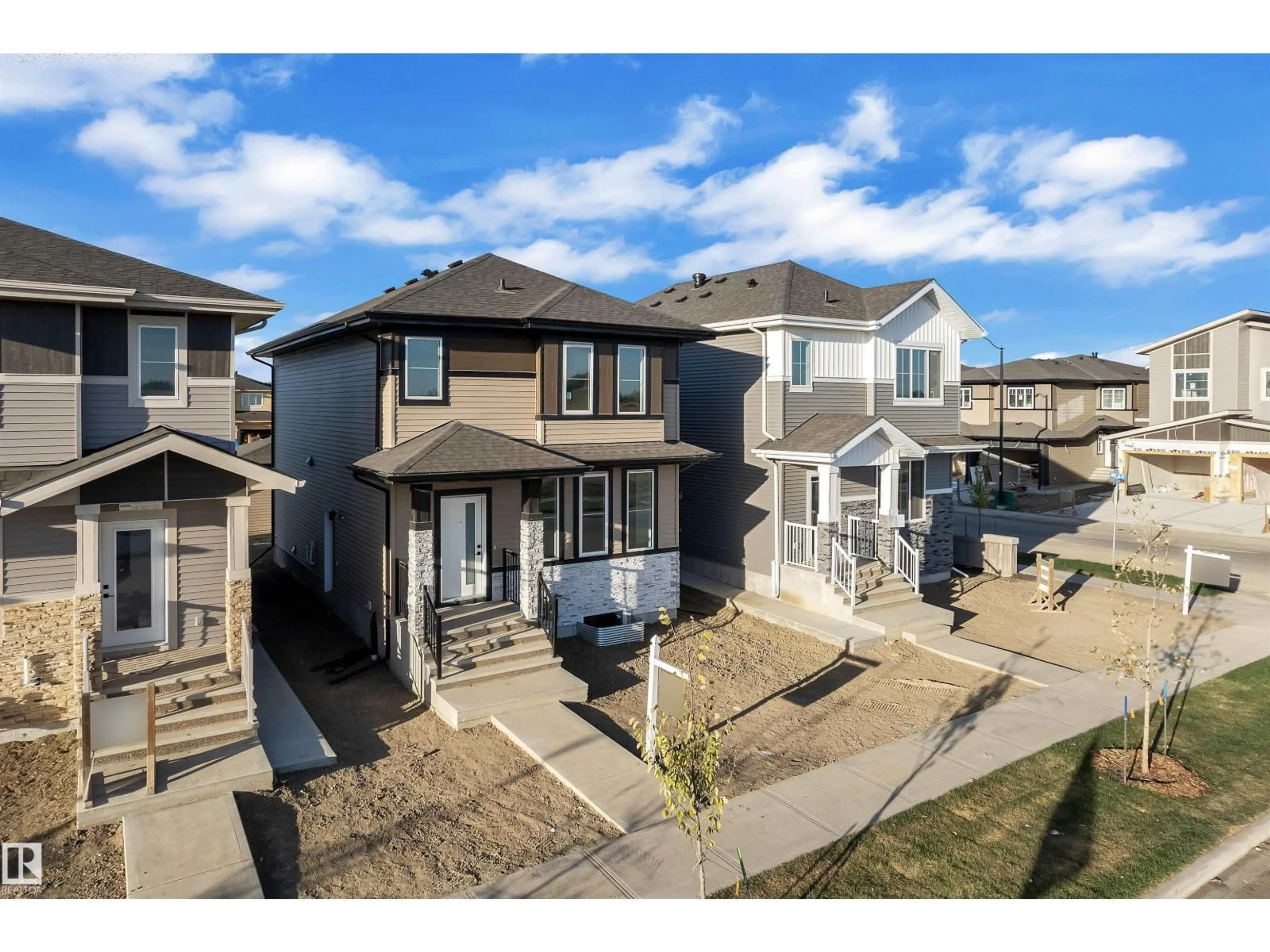 A pic from outside/outdoor area/front of a property/back of a property/a pic from drone, street for 3604 39 AV, Beaumont Alberta T4X3H2