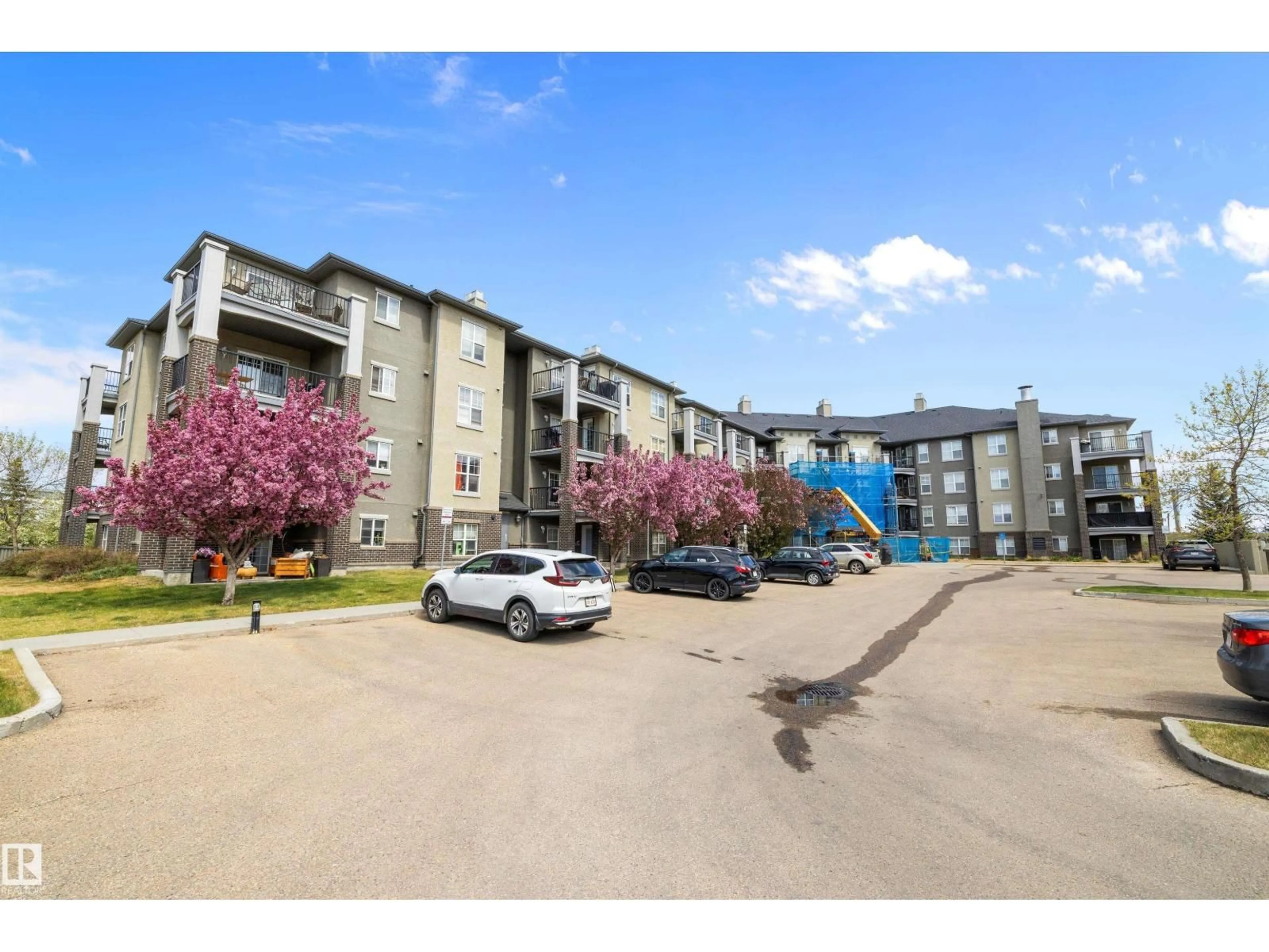 A pic from outside/outdoor area/front of a property/back of a property/a pic from drone, unknown for 411 - 636 MCALLISTER LO, Edmonton Alberta T6W1N4