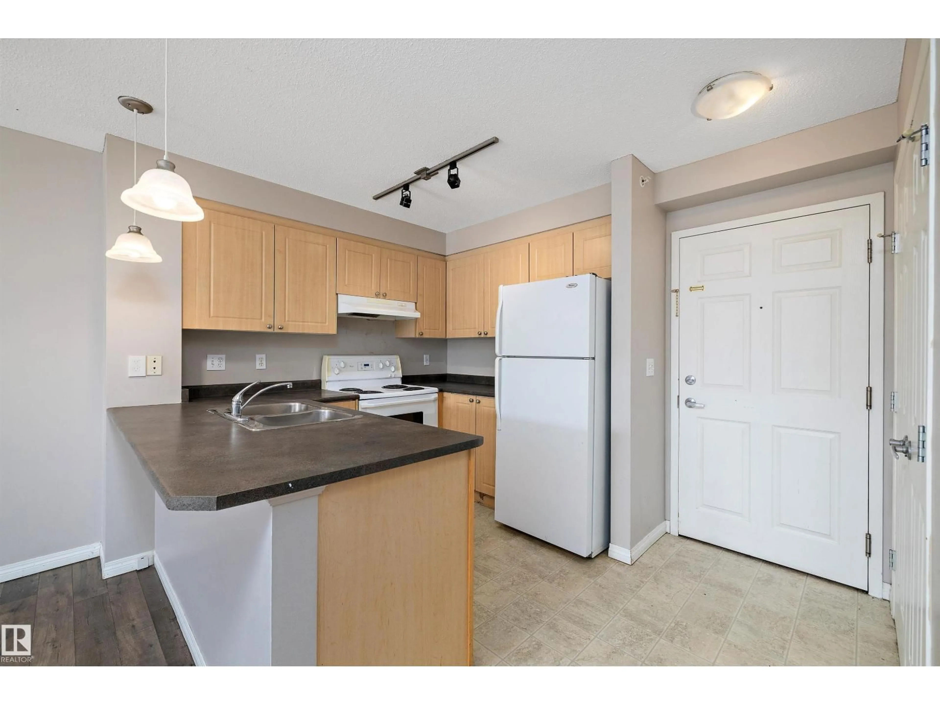 Standard kitchen, unknown for 411 - 636 MCALLISTER LO, Edmonton Alberta T6W1N4