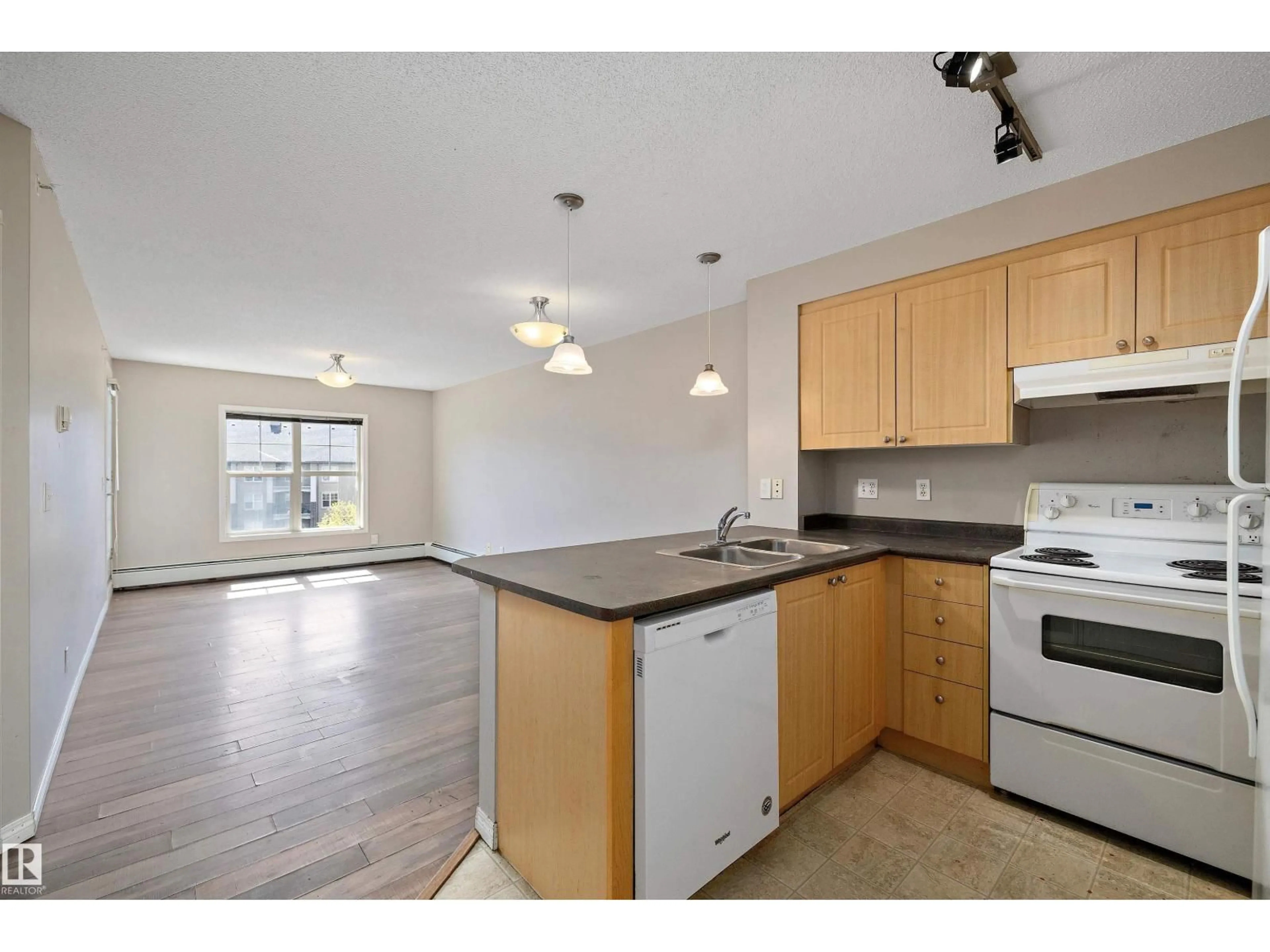 Standard kitchen, wood/laminate floor for 411 - 636 MCALLISTER LO, Edmonton Alberta T6W1N4