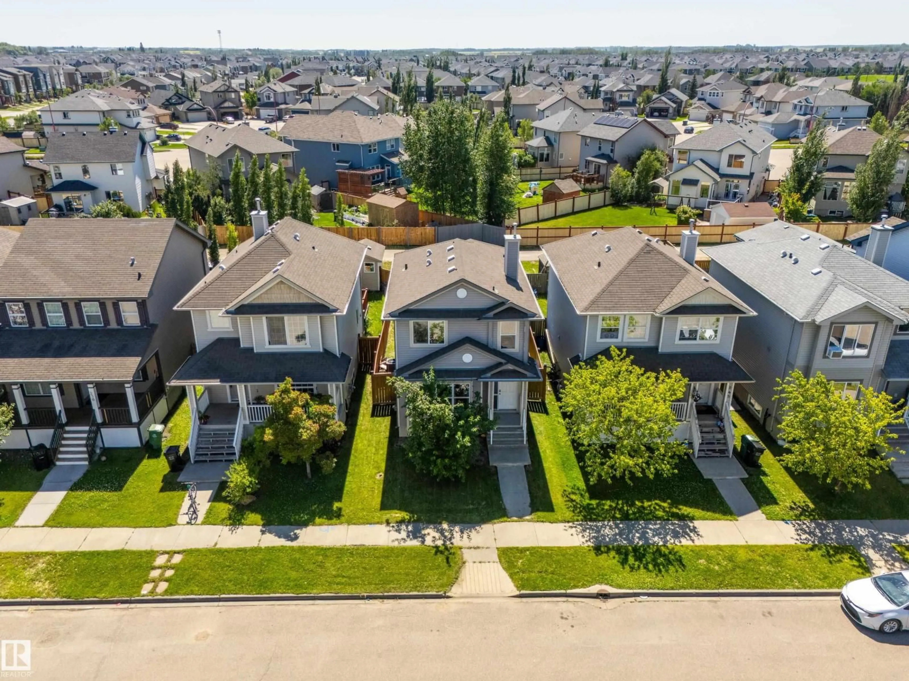 A pic from outside/outdoor area/front of a property/back of a property/a pic from drone, street for 243 SOUTHWICK WY, Leduc Alberta T9E0G1