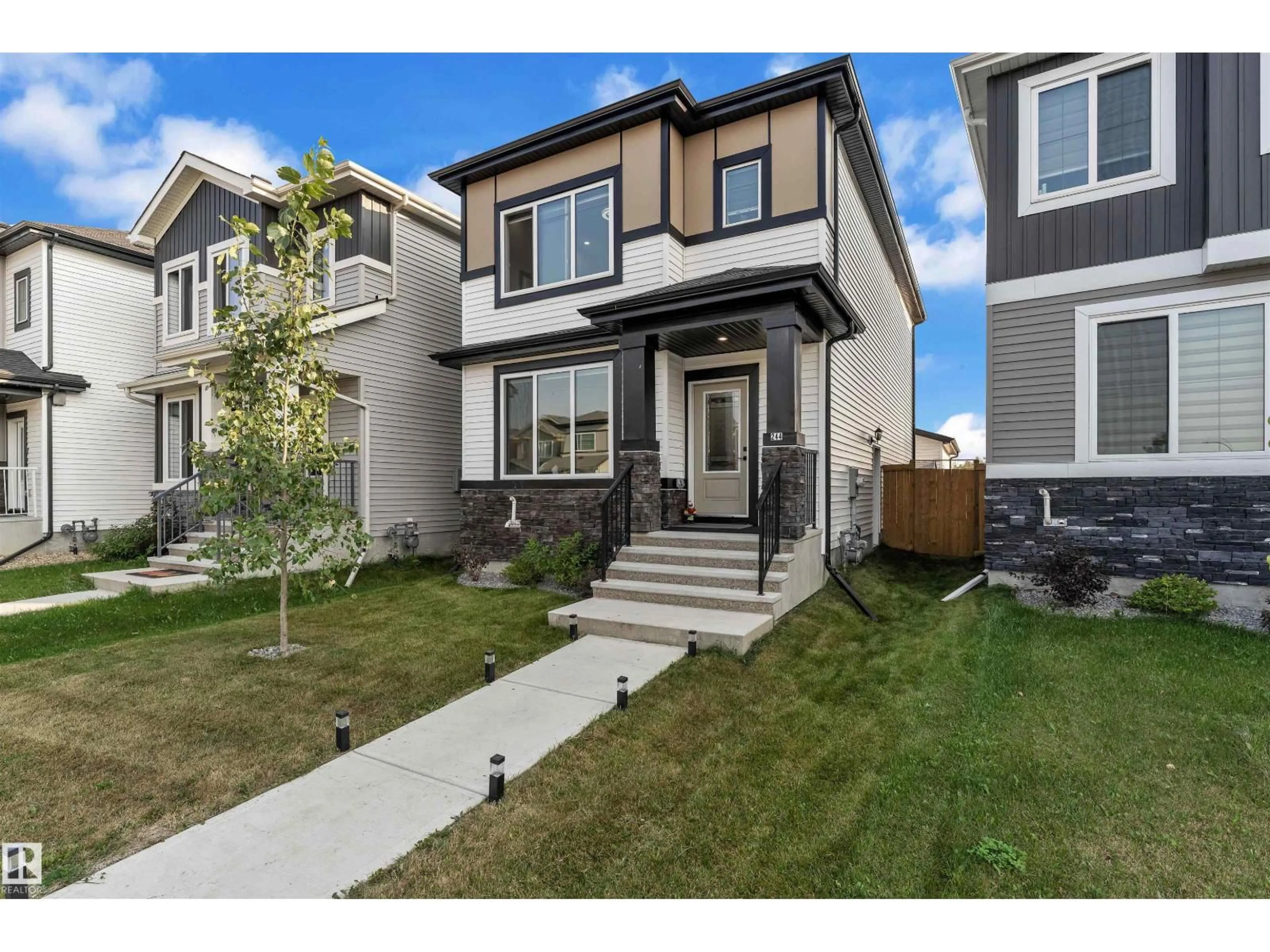Home with vinyl exterior material, street for 244 ROLSTON WD, Leduc Alberta T9E1N1