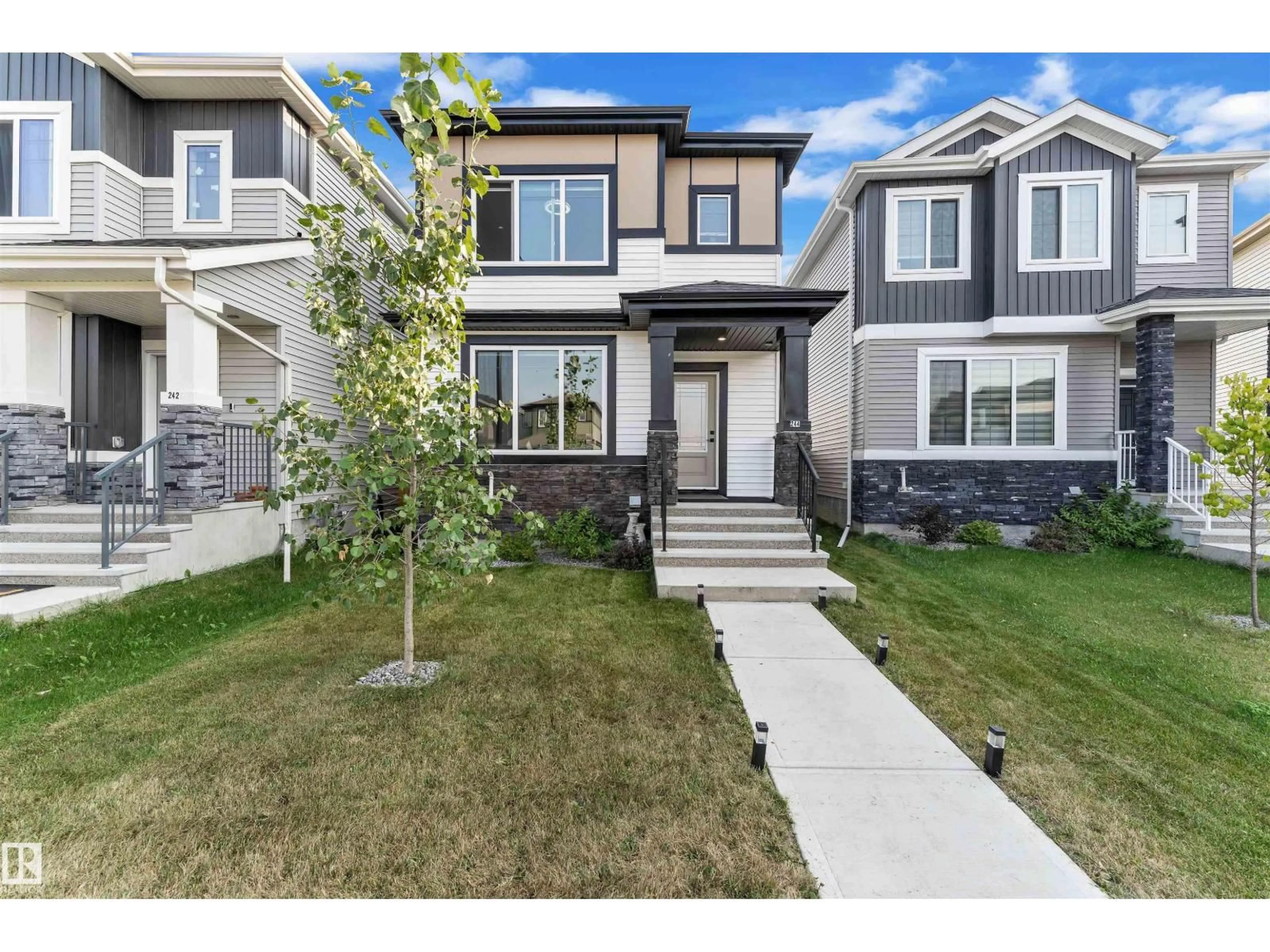 Home with vinyl exterior material, street for 244 ROLSTON WD, Leduc Alberta T9E1N1