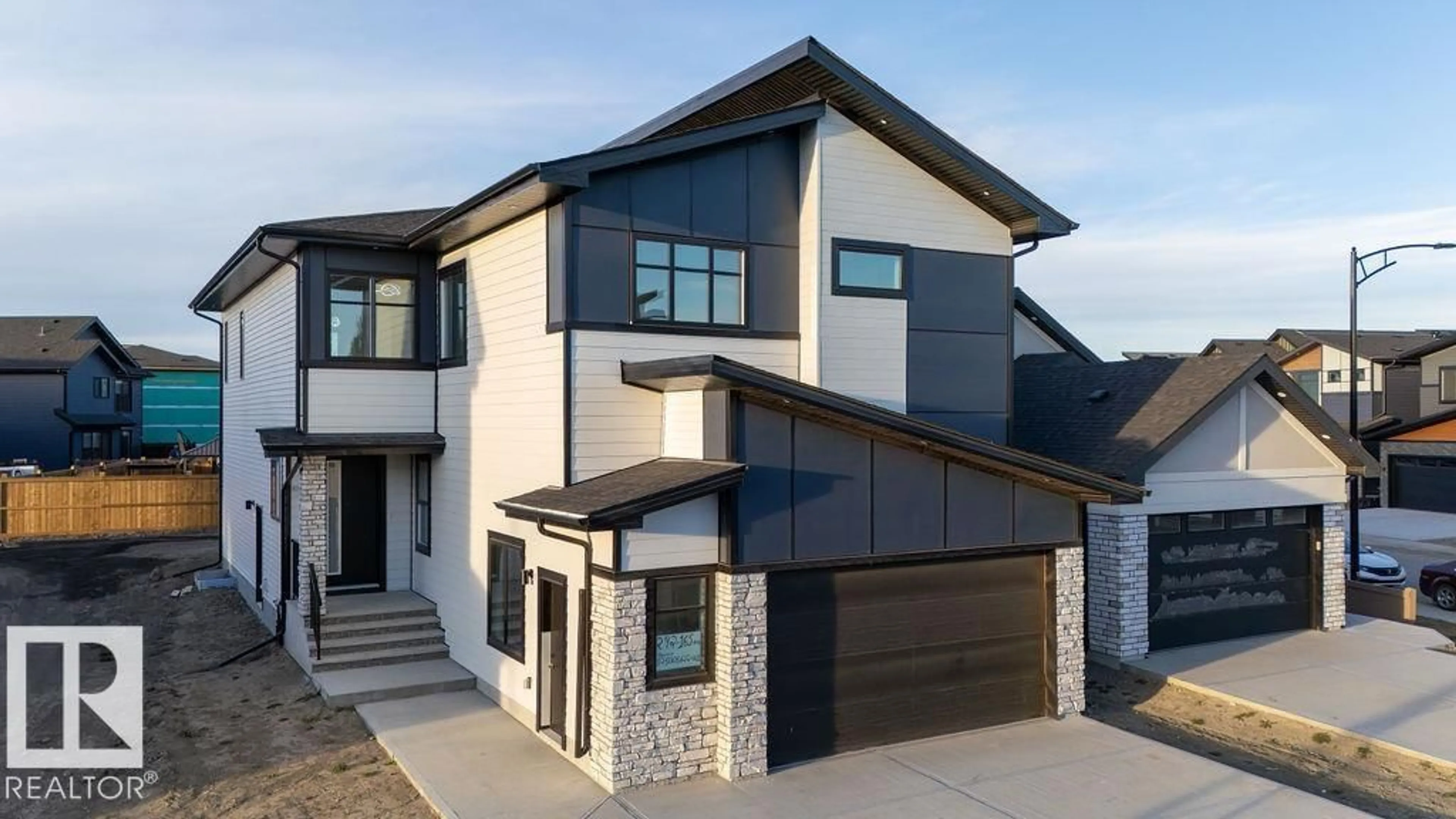 Home with brick exterior material, street for 292 165 AV, Edmonton Alberta T5Y3K7