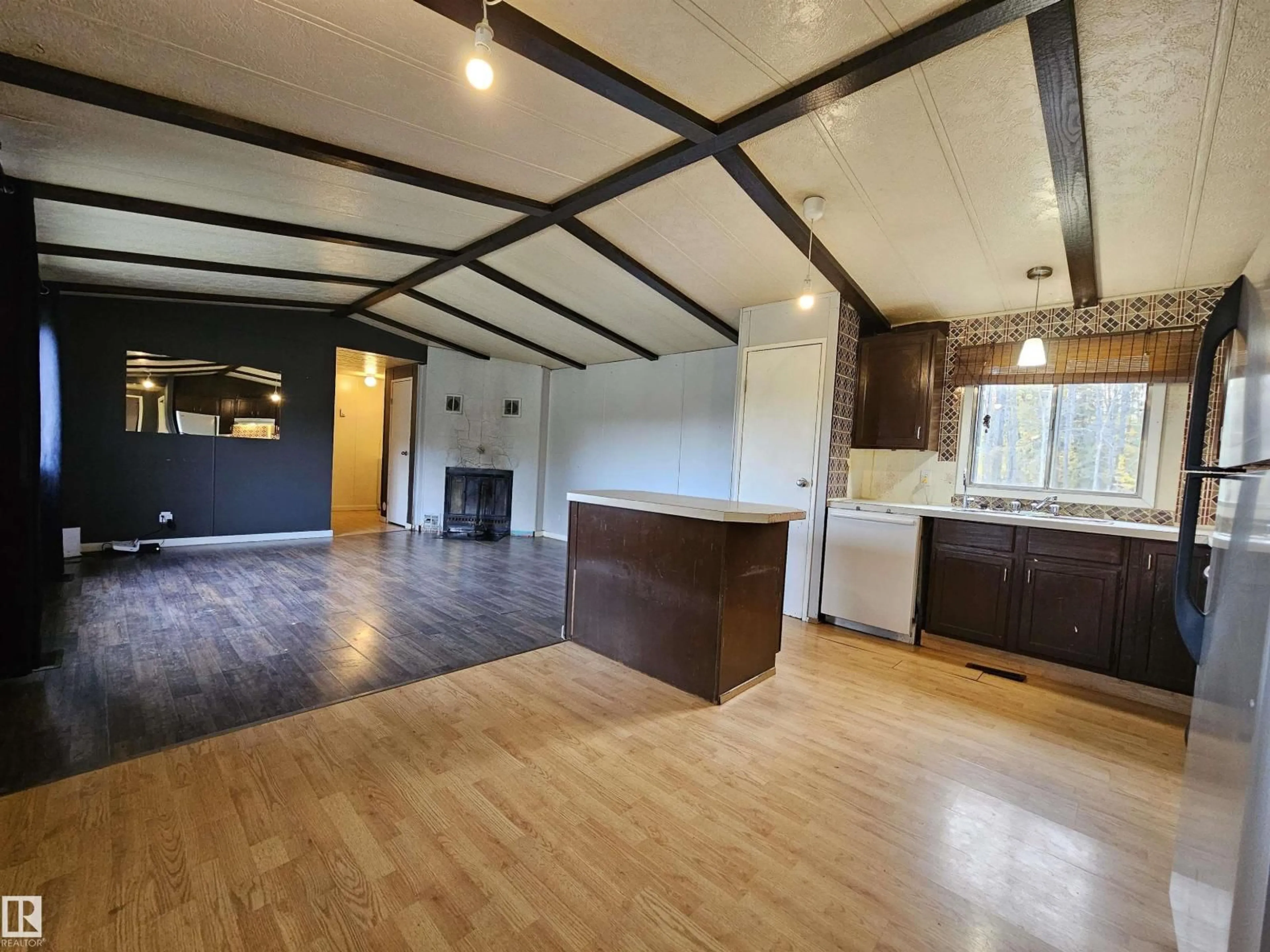 Open concept kitchen, wood/laminate floor for 49510 RGE ROAD 80, Rural Brazeau County Alberta T7A2A3