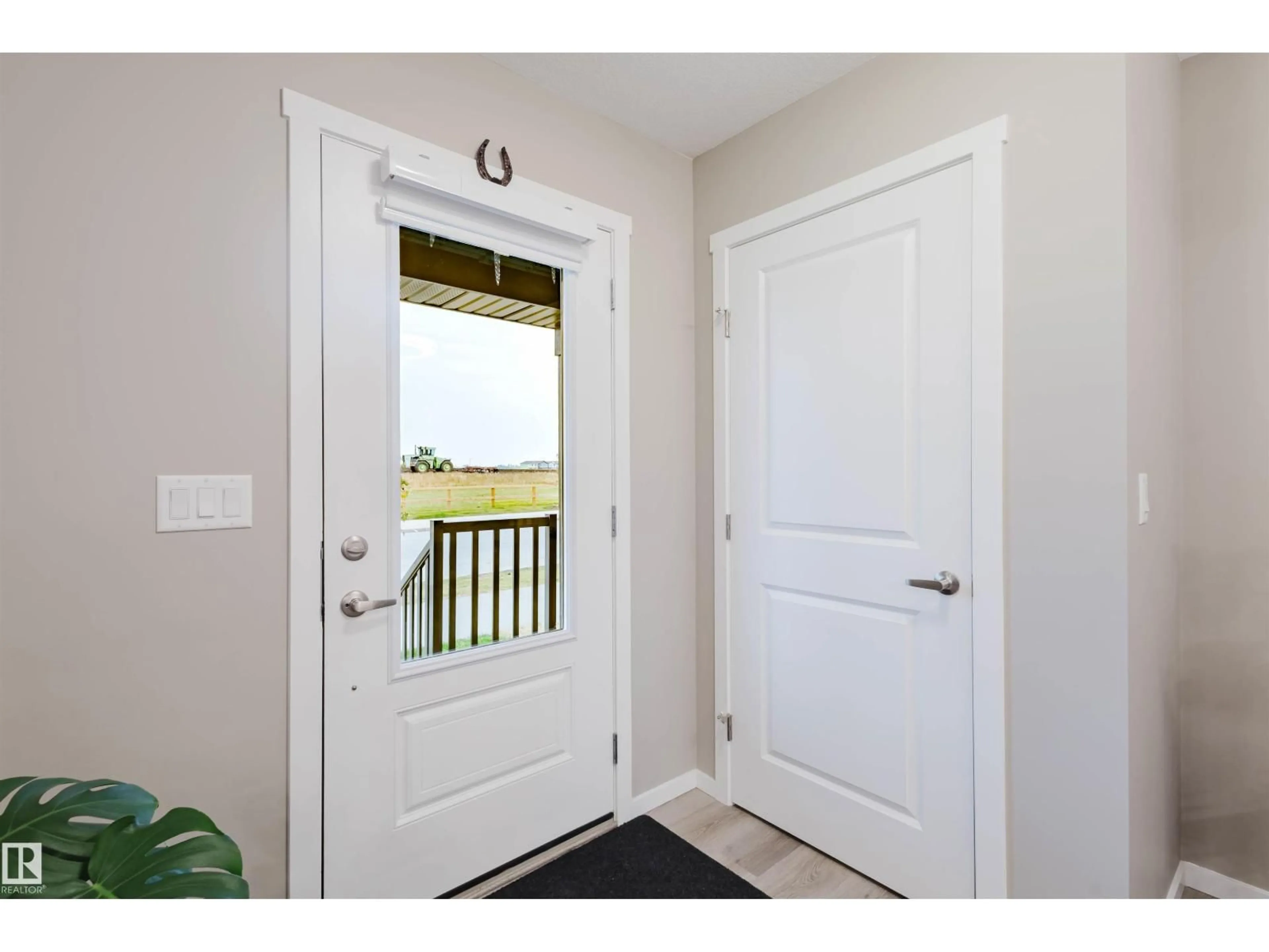 Indoor entryway for 20808 19 AV, Edmonton Alberta T6M1R5