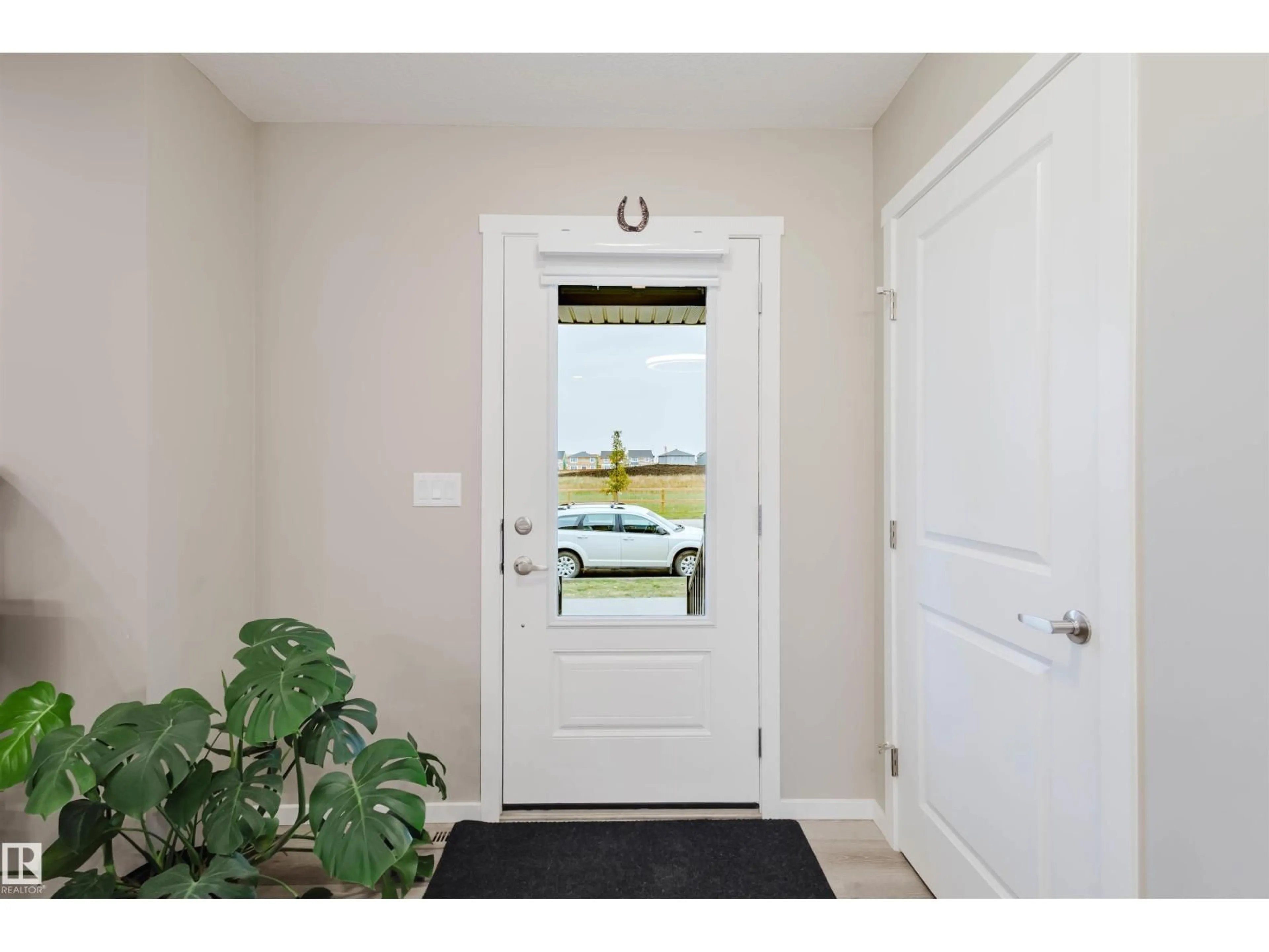 Indoor entryway for 20808 19 AV, Edmonton Alberta T6M1R5