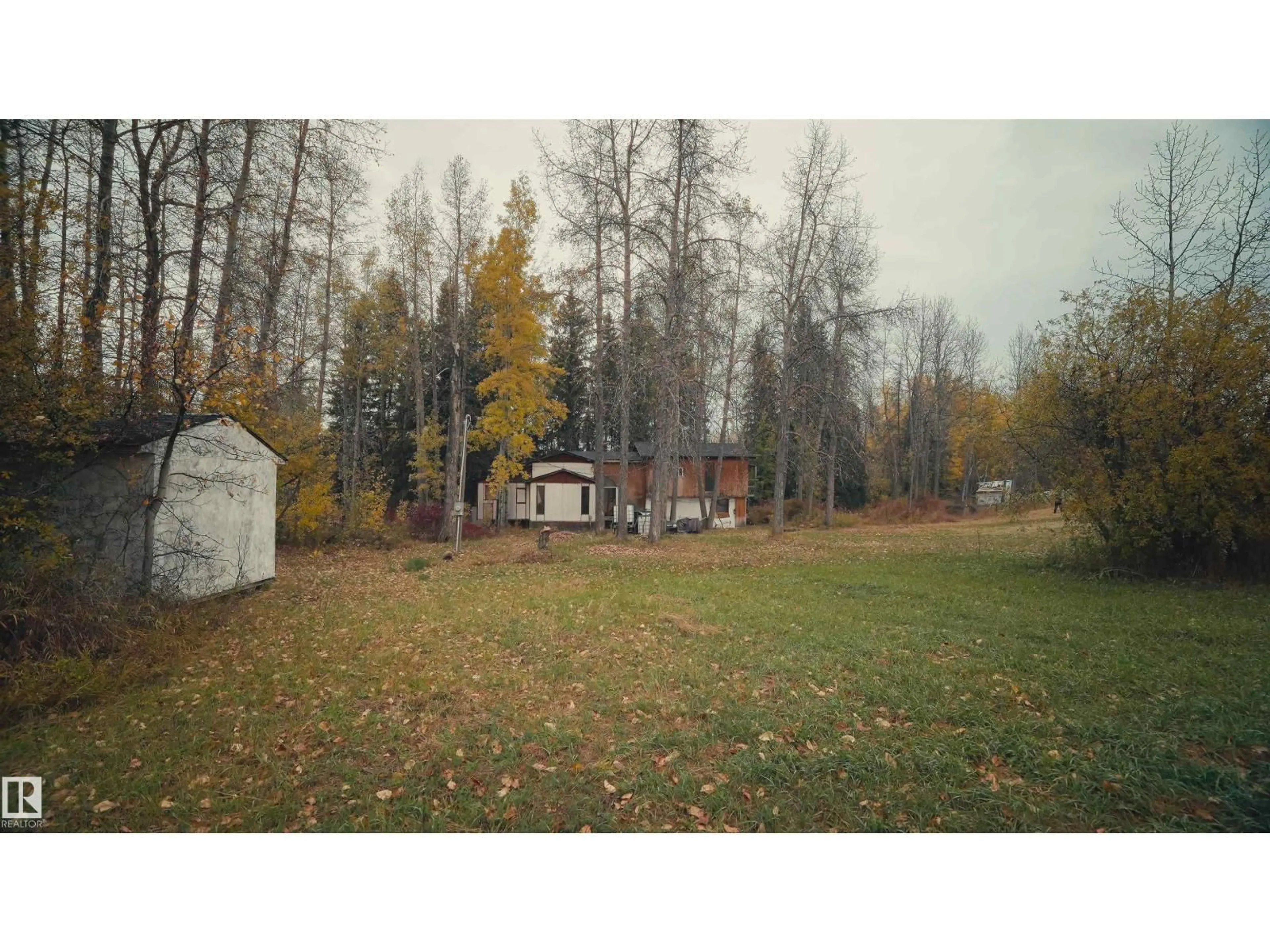 A pic from outside/outdoor area/front of a property/back of a property/a pic from drone, forest/trees view for 3 B - 3104 TWP ROAD 524, Duffield Alberta T7Y3M5