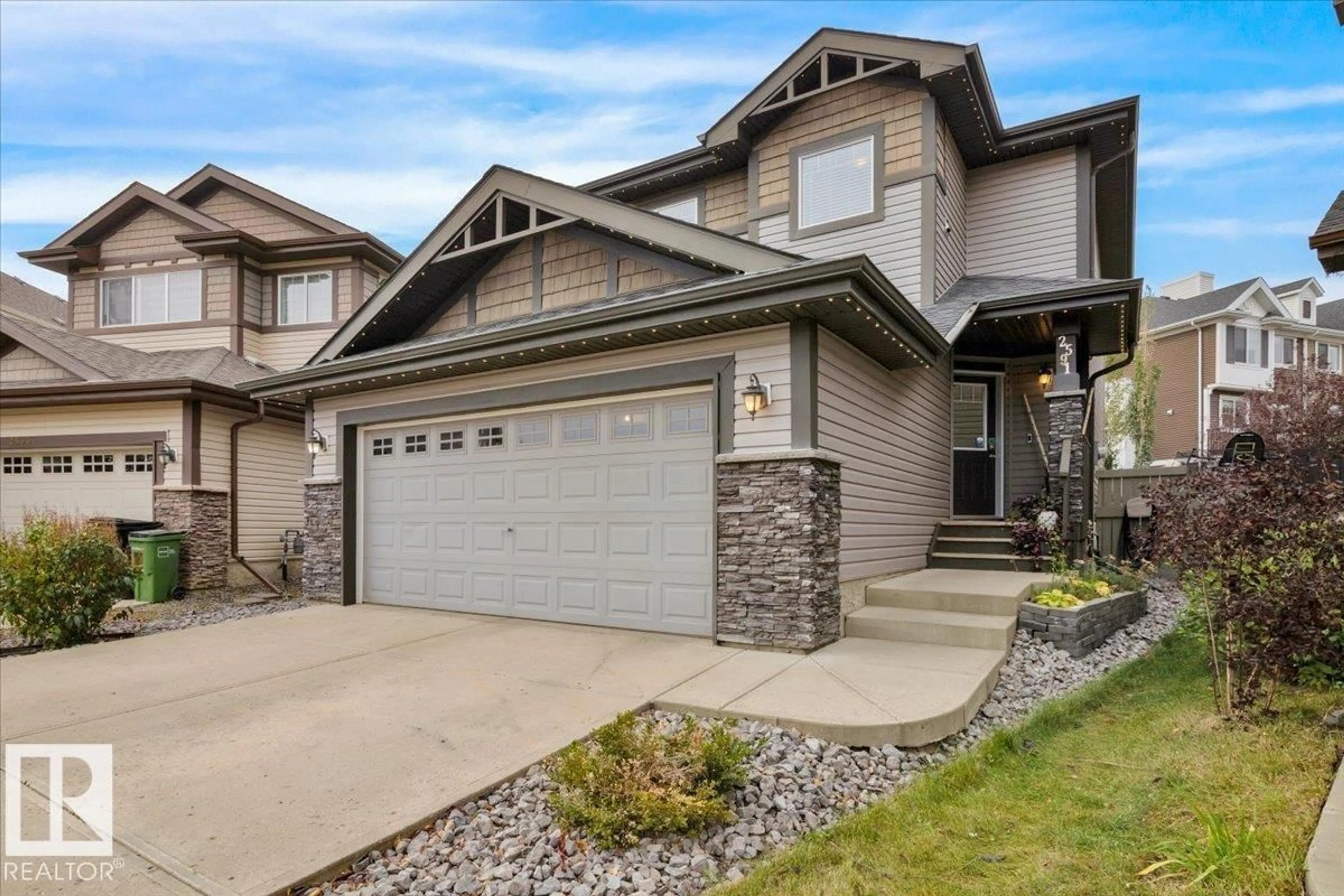 Home with vinyl exterior material, street for 2591 COLE CR, Edmonton Alberta T6W2A3