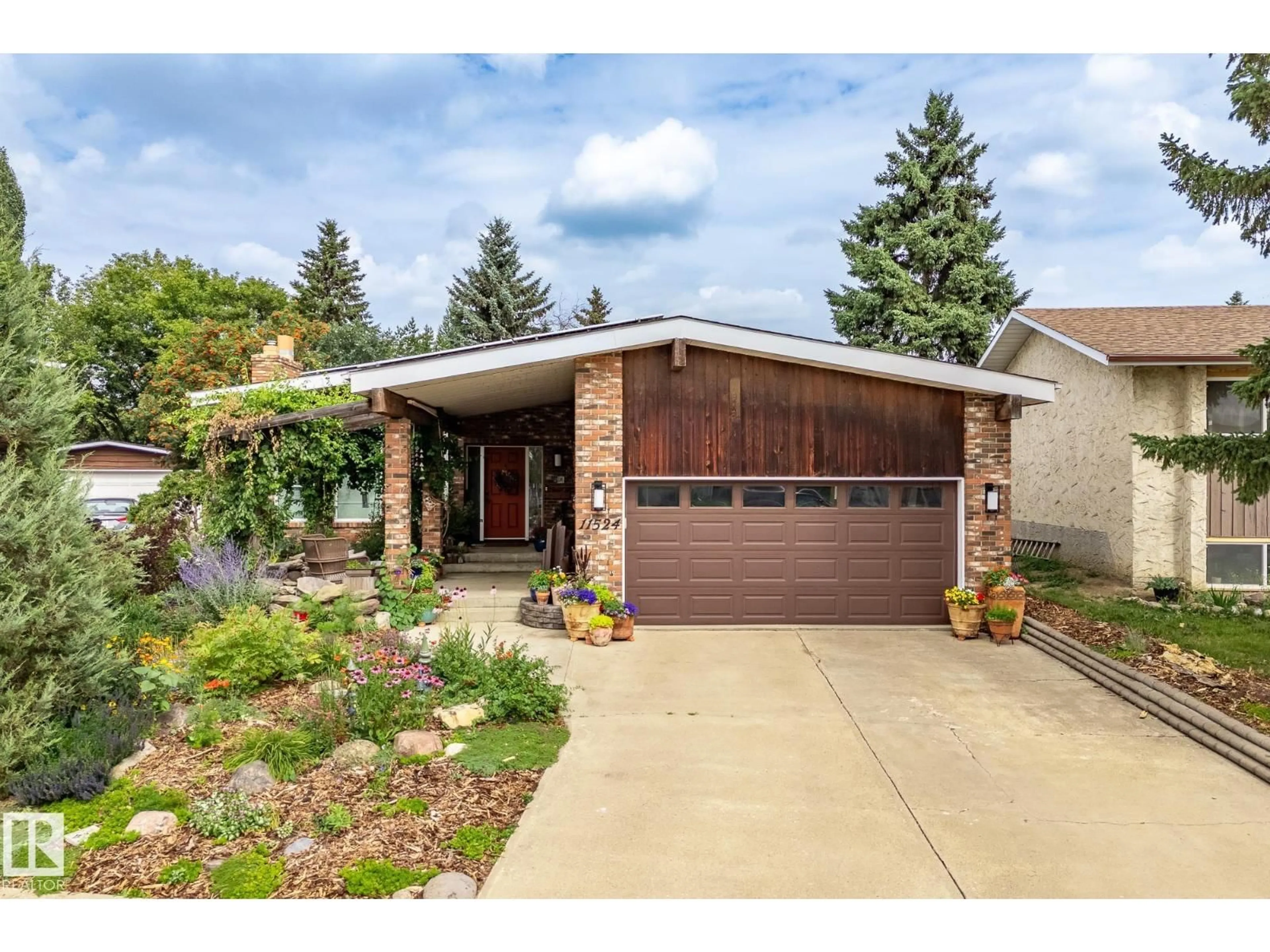 Home with brick exterior material, street for NW - 11524 152B AV, Edmonton Alberta T5X1E8
