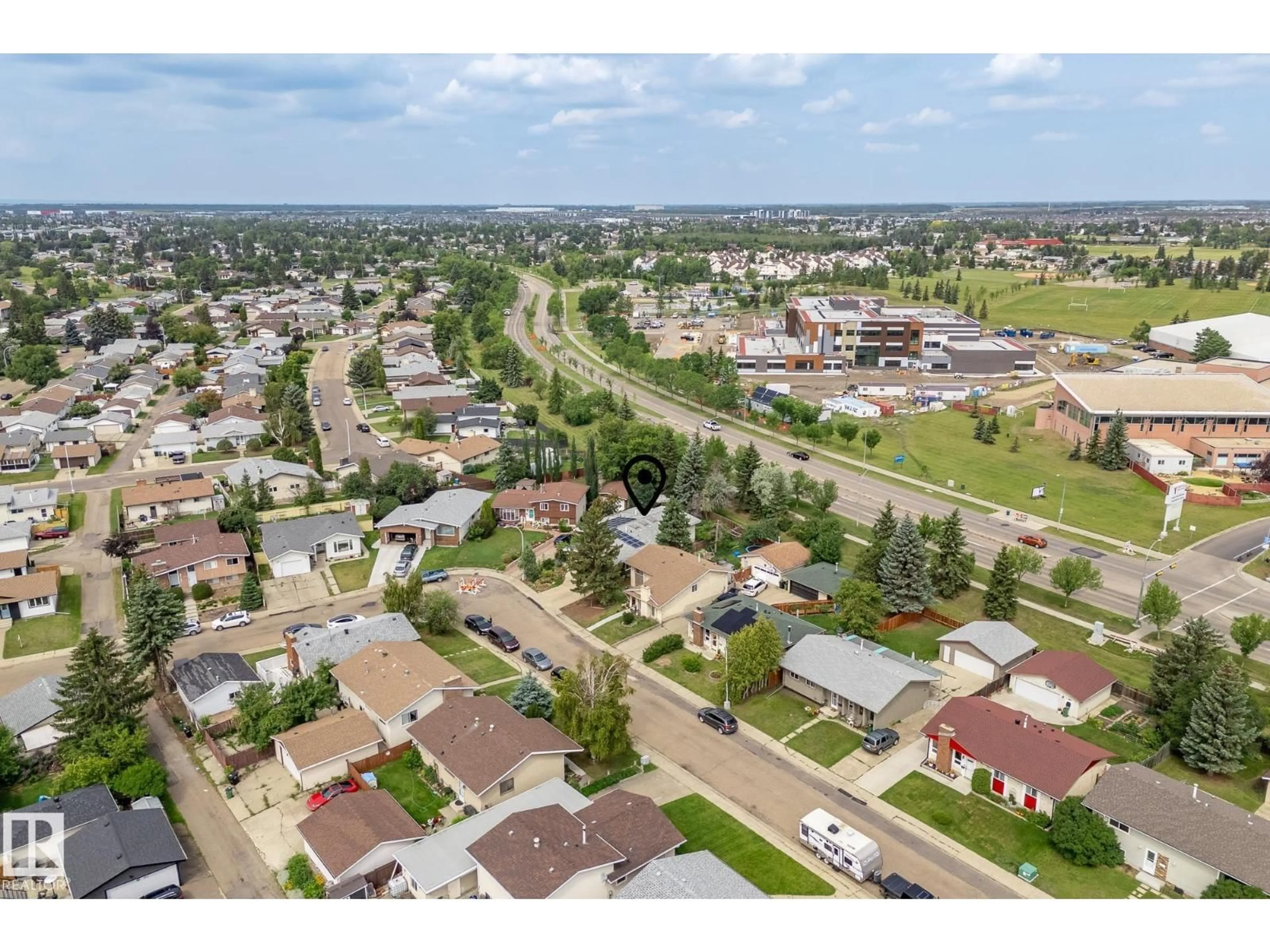 A pic from outside/outdoor area/front of a property/back of a property/a pic from drone, street for NW - 11524 152B AV, Edmonton Alberta T5X1E8