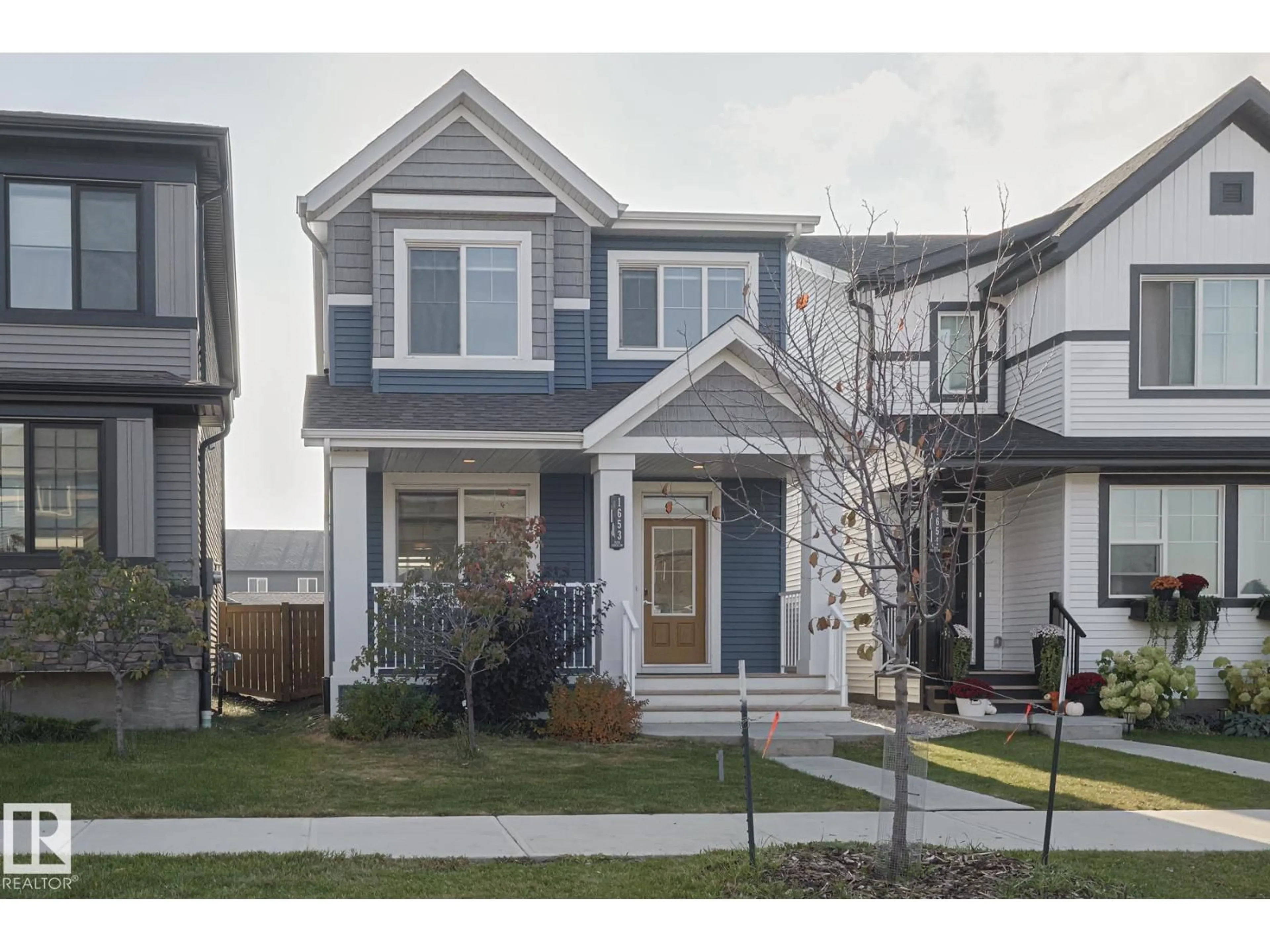 Home with vinyl exterior material, street for CI SW - 1653 PLUM CIRCLE, Edmonton Alberta T6X2Y5