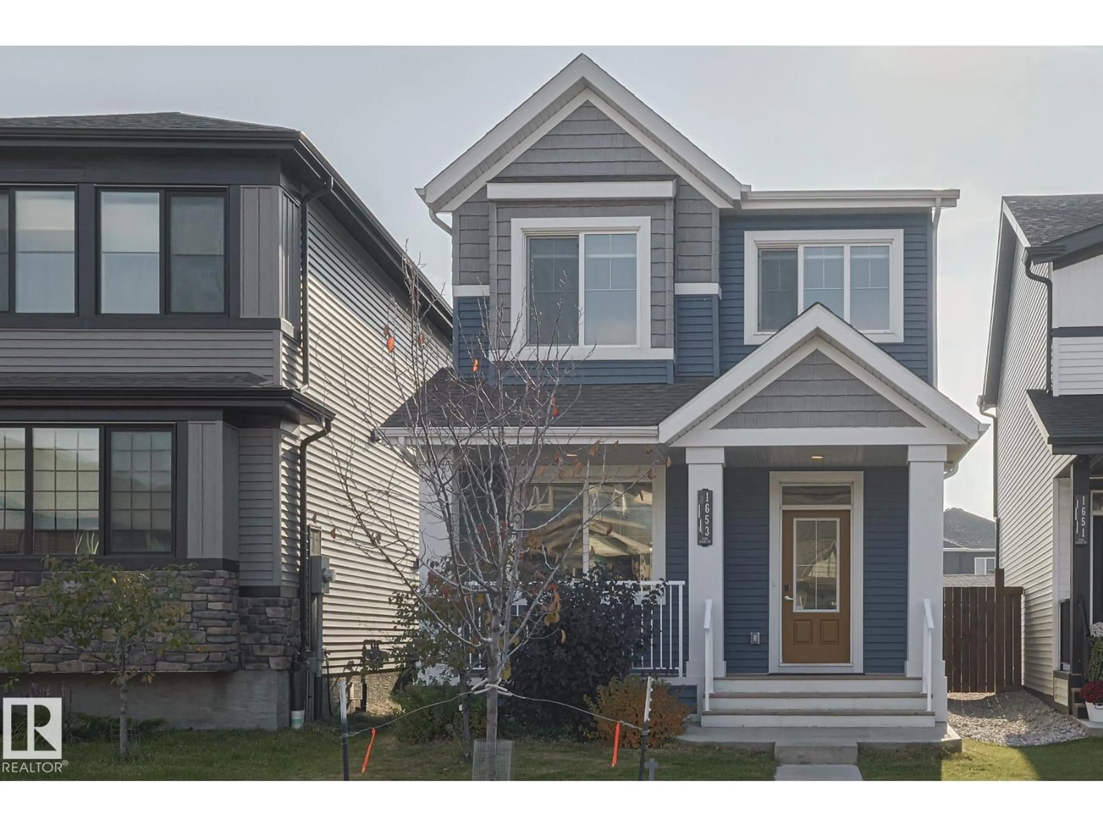 Home with vinyl exterior material, street for CI SW - 1653 PLUM CIRCLE, Edmonton Alberta T6X2Y5
