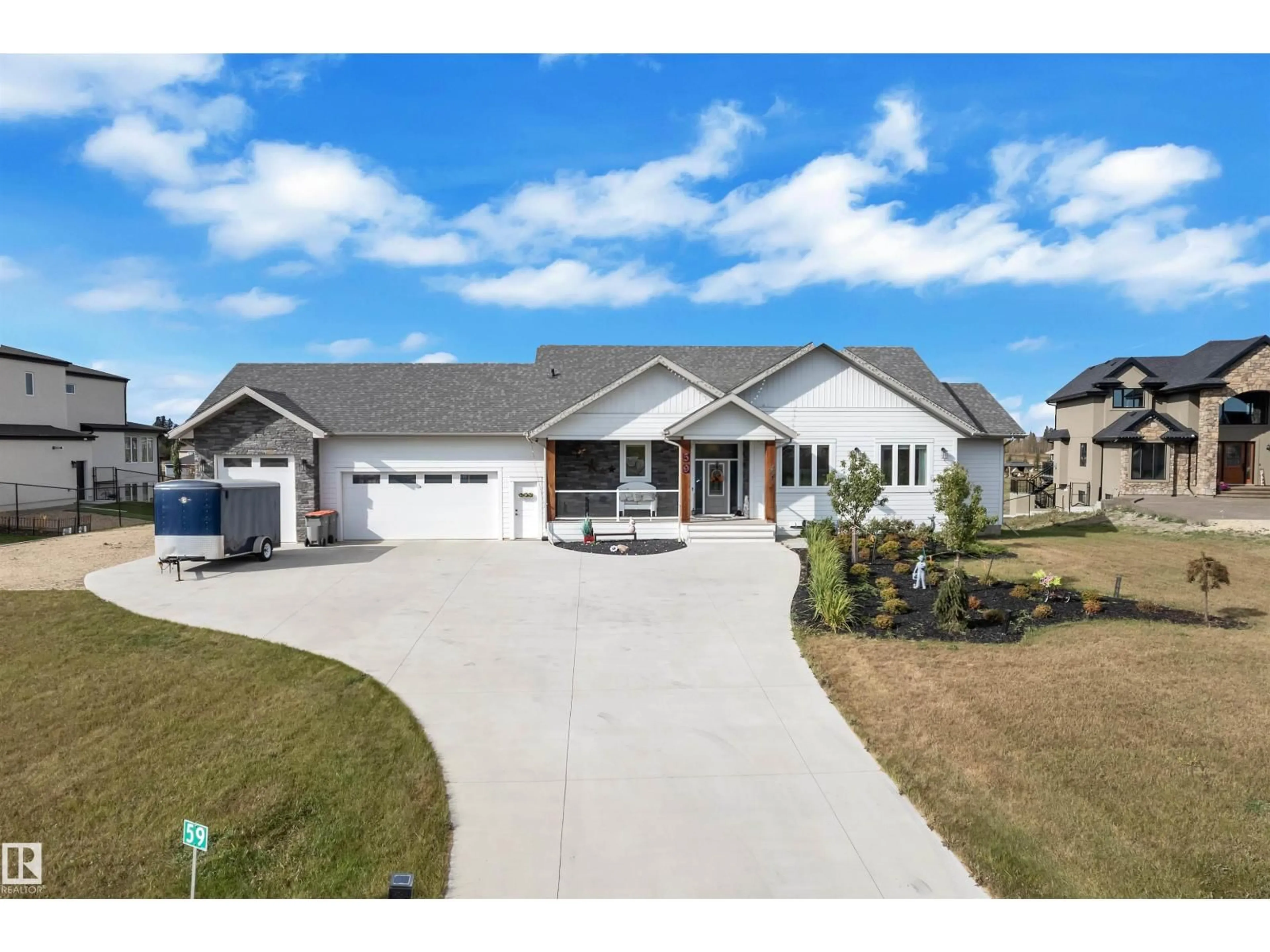 Home with vinyl exterior material, street for 59 26409 TWP ROAD 532 A, Rural Parkland County Alberta T7X0G3