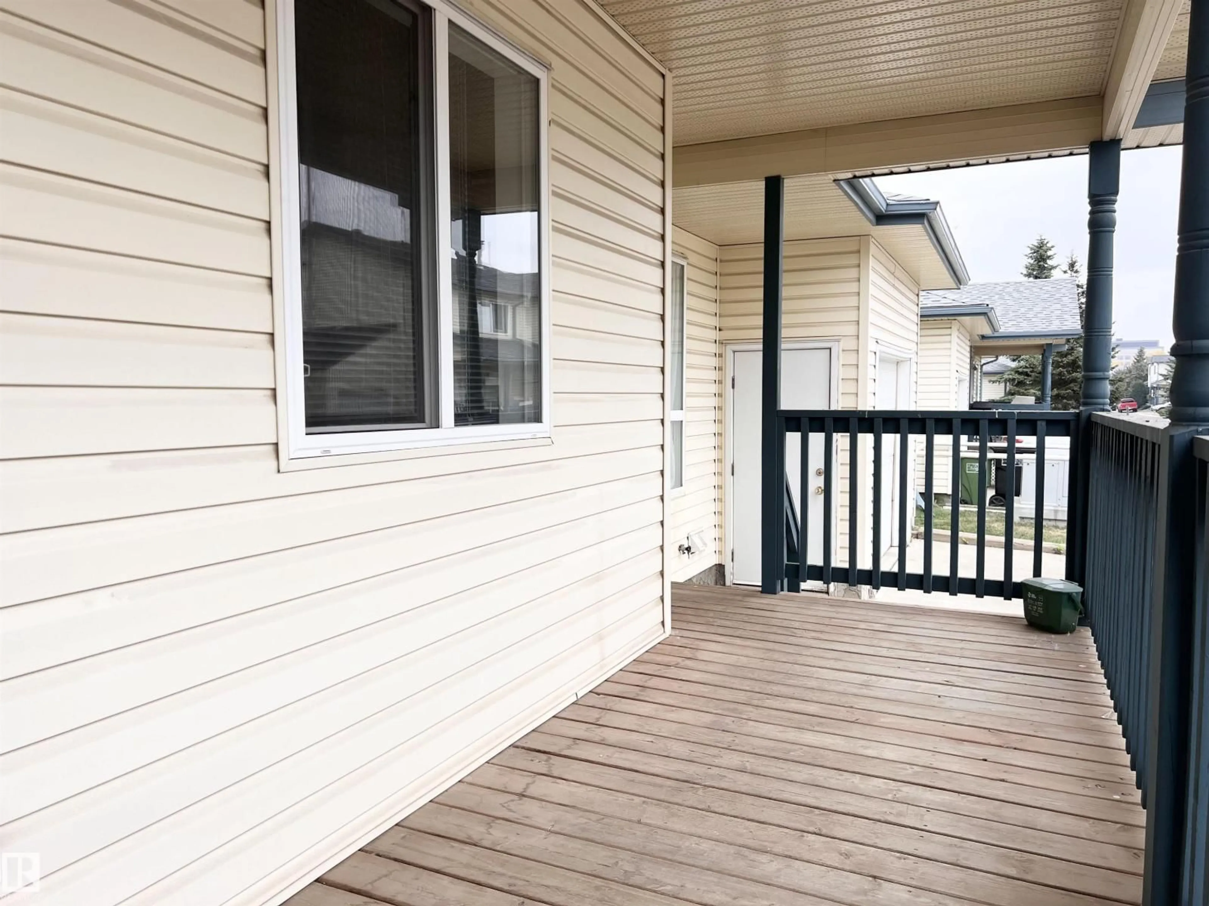Home with vinyl exterior material, street for 10909 - 19 106 ST NW, Edmonton Alberta T5H4M7