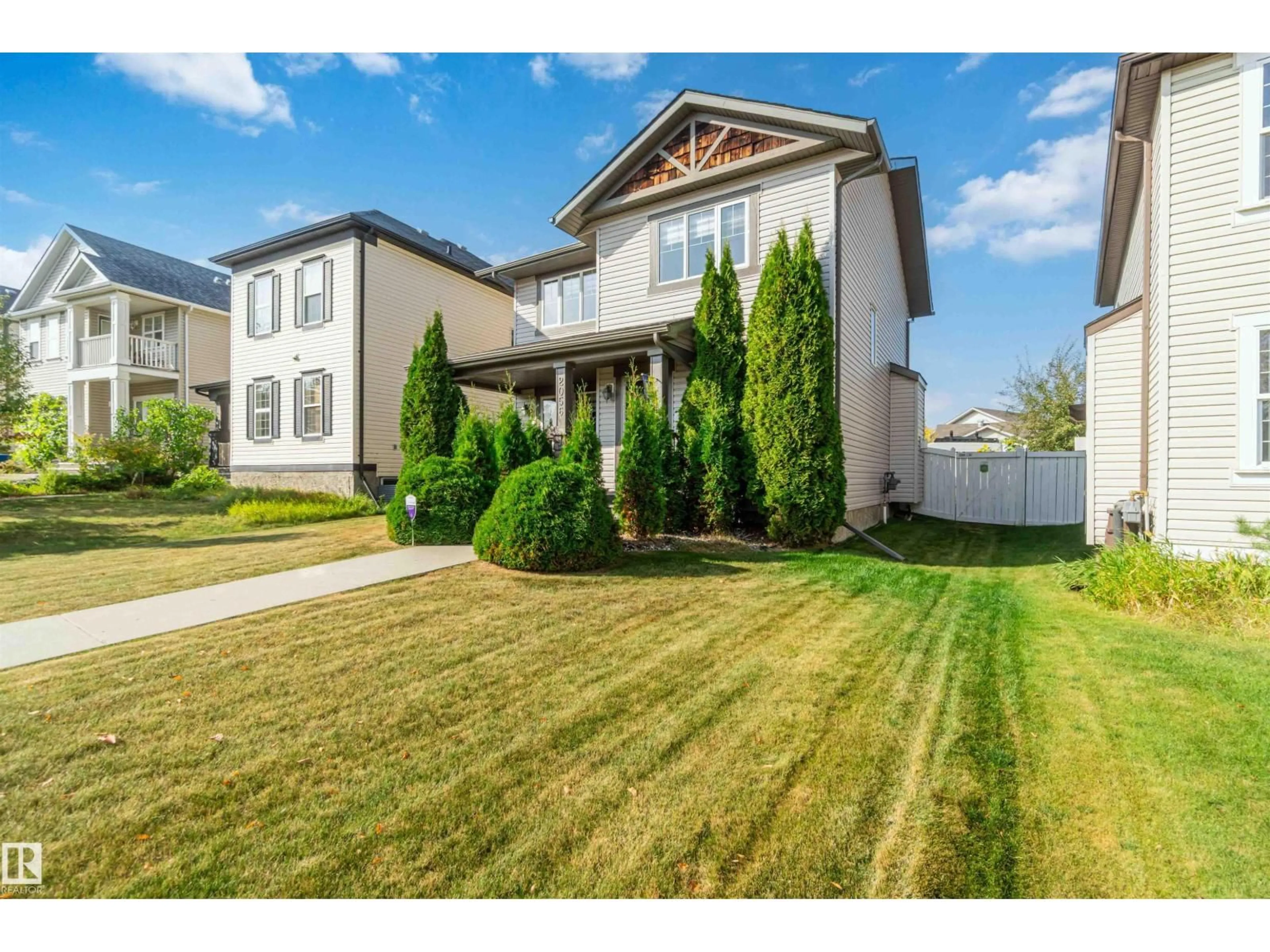 Home with vinyl exterior material, street for 2056 TOWNE CENTRE BV, Edmonton Alberta T6R3M7